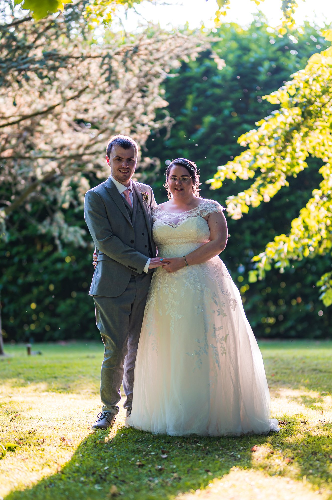 Bride and groom in the sunlight