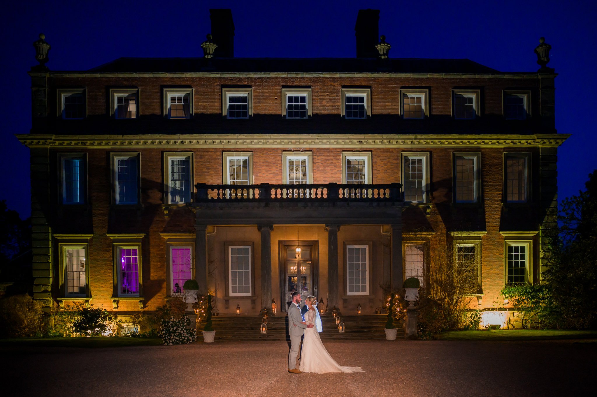 Couple outside Davenport House at night