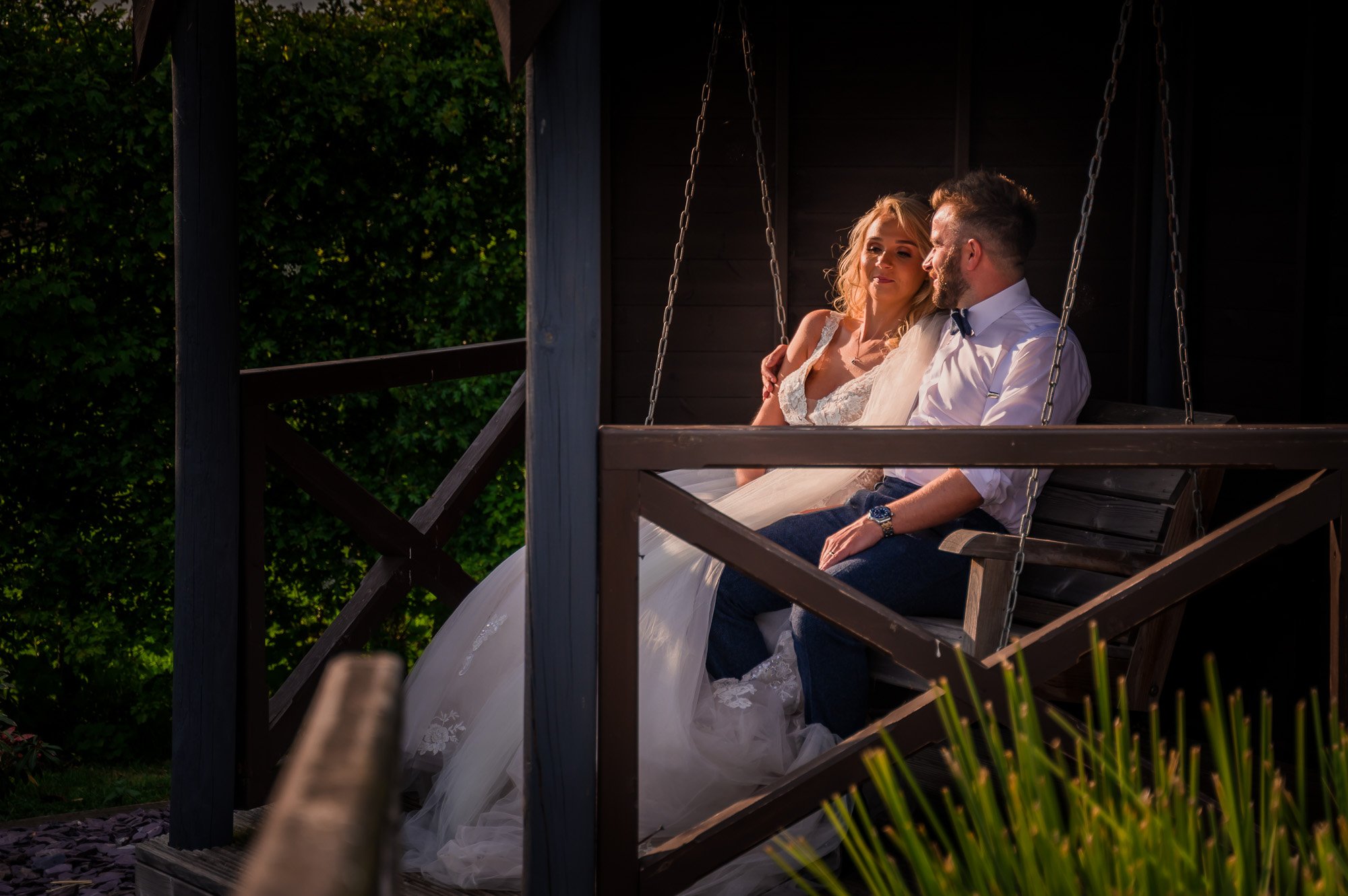 Sunset cuddle for the bride and groom