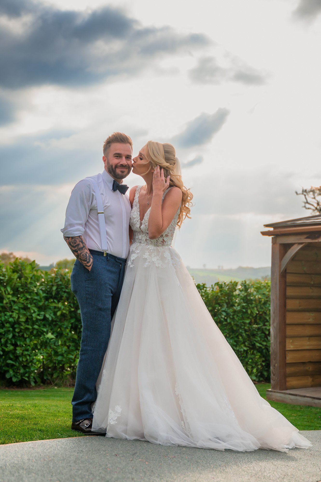 Bride kisses her groom