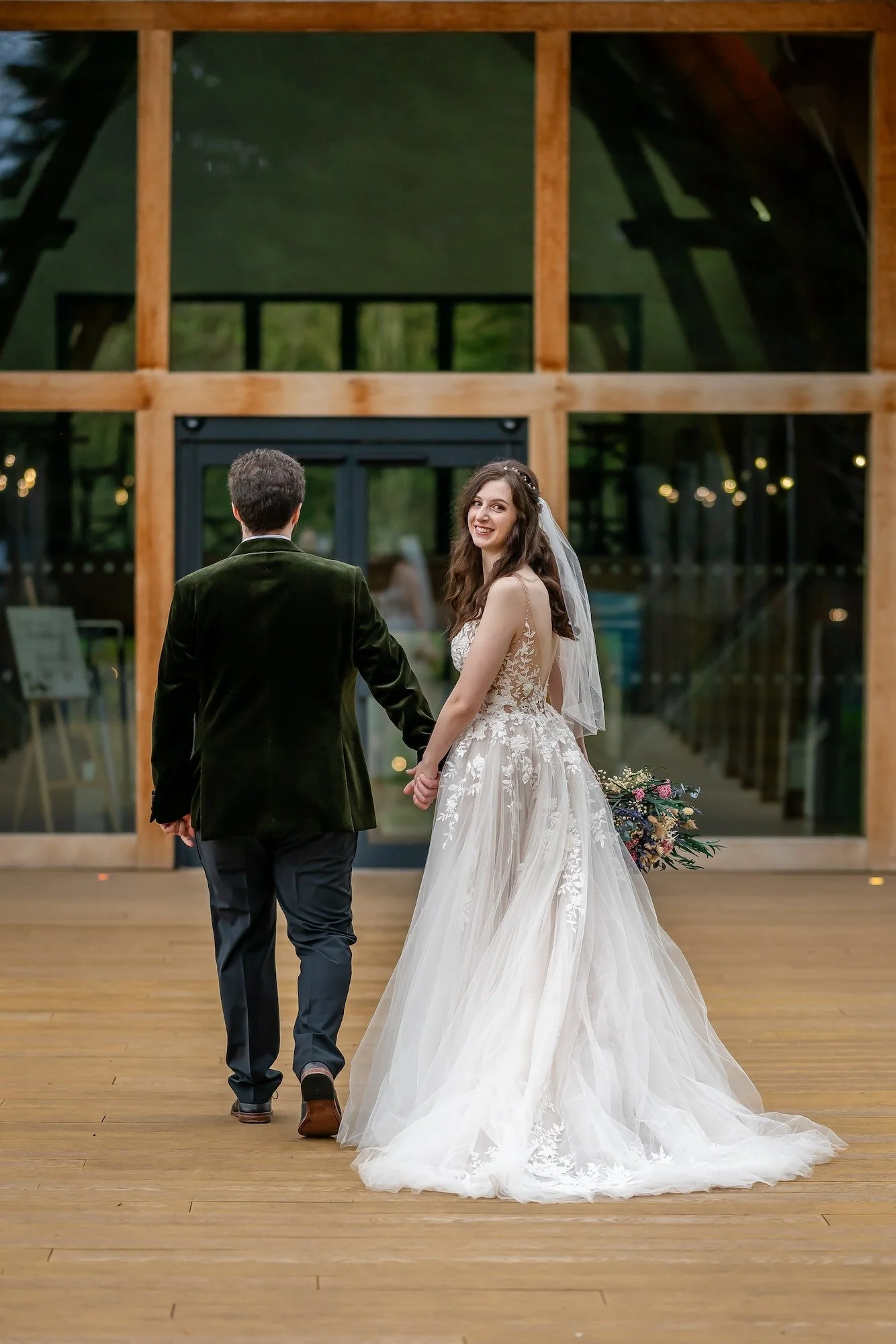 Jen looks back at the camera at The Mill Barns Wedding Venue