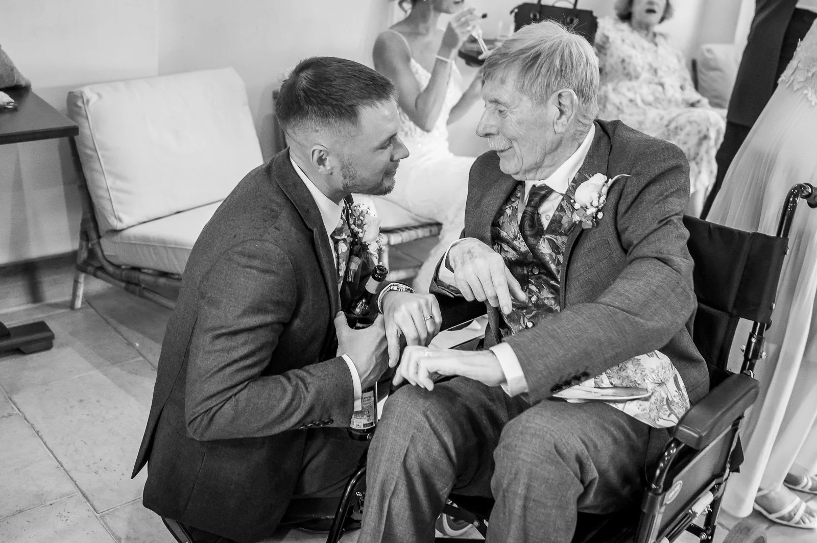 Groom talking to his grandfather