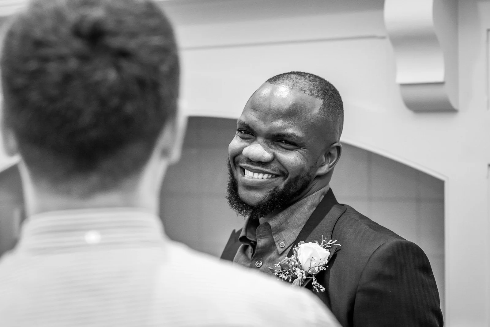 Groom laughing