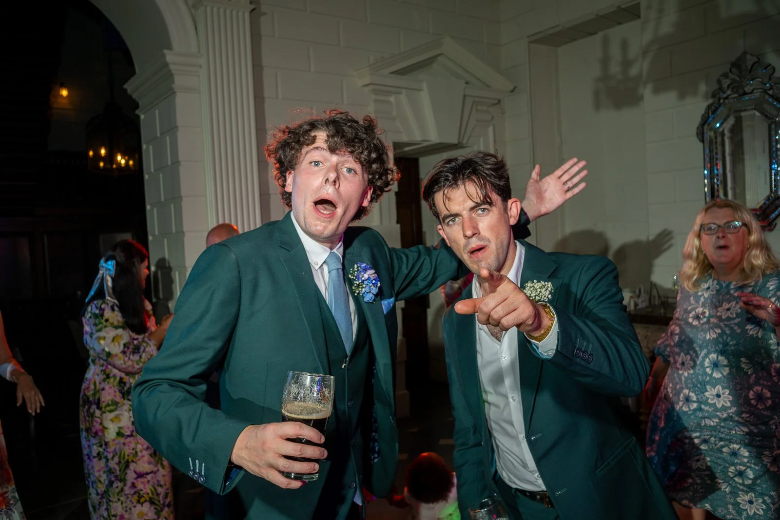 Groom and best man dancing