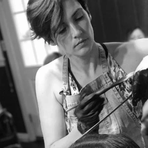Anny claims she’s been a hairdresser her whole life, with an early passion for styling hair. Officially her career began at age 17 and her love of the industry is still going strong 20 years later. Most of Anny’s knowledge and skill has been gained through years of hard work and dedication to her practice. She went straight from beauty school to working on the salon floor building and extensive clientele. She has developed a keen ability to think through problems and find solutions, putting her at the top in her field for color correction and creative color techniques like Balayage. After spending two years working as a national Balayage Educator for The Business of Balayage, Anny discovered her passion for helping others gain confidence in their technical skills. For Anny, educating is not work, it’s purely fun. She enjoys creating a relaxed environment where people feel comfortable asking questions and interacting and learning with one another. Be warned that she thinks she’s pretty funny - that’s still to be determined. Anny has perfected the “natural look” and incorporates a multitude of techniques to create that perfect blend. She offers techniques and solutions to create beautiful, dimensional color on our everyday clients - grey hair, thin hair, curly hair, short hair. Very few unicorns ever enter Anny’s world! Anny loves the actual business of hairdressing and has spent the better part of her career implementing different business techniques to grow her own business behind the chair. In 2018 she will be opening her first salon and can’t wait to grow a strong and successful team using all of the techniques she’s been putting in to practice for years. She truly thrives on helping others achieve their goals and feel empowered.