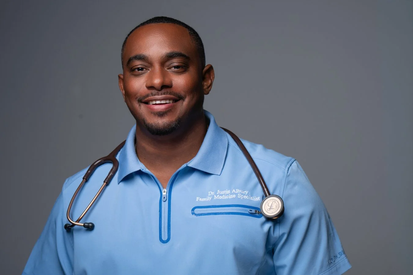Justin Albury, MD
