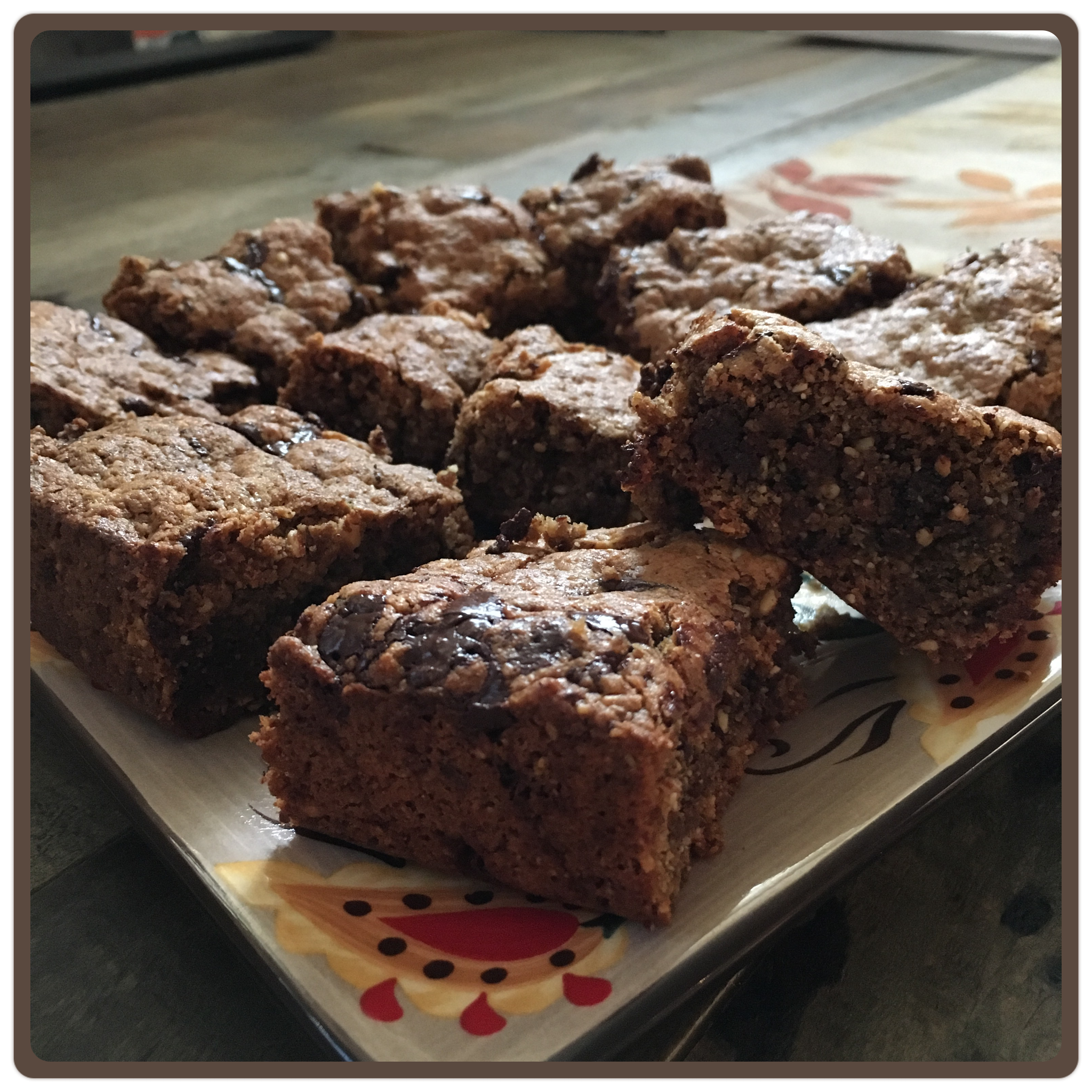 Chocolate Chip Almond Butter Brownies Dry Ingredients: 1/4 cup + 2 tbsp Coconut Flour 1/4 cup Coconut Sugar 1/2 tsp Baking Soda 1/4 tsp Sea Salt 1/2 cup Chocolate Chips Wet Ingredients: 1 cup Almond Butter 1 Egg 1/2 tsp Vanilla Extract Directions: 1. Preheat oven to 350 degrees F, grease baking pan and set aside. Use an 9X5 loaf pan for thicker brownies and 8X8 for thinner brownies. 2. Combine all ingredients except chocolate chips in a small bowl. Once batter is well combined add the chocolate chips. 3. Spread batter in pan and press down firmly until uniformly flattened. 4. Bake for 20 min (8X8), 25 min (9X5) or until a toothpick comes out clean. 5. Let brownies cool before cutting them.
