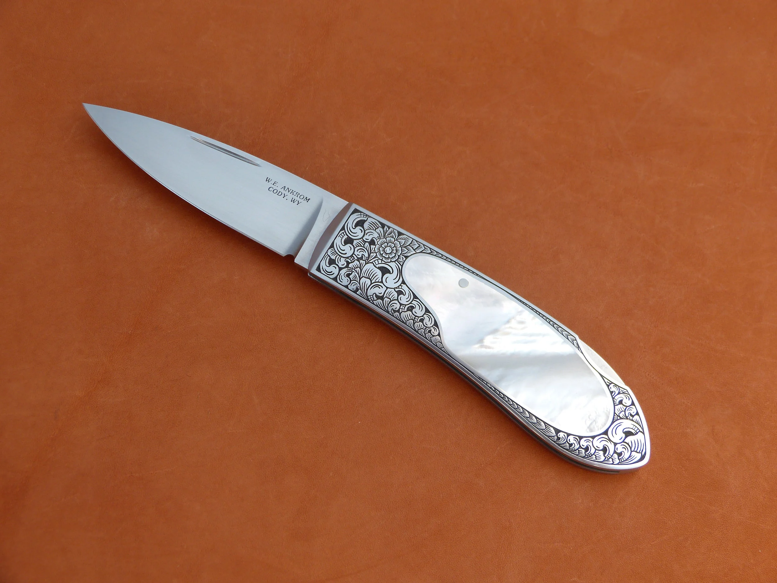 W.E. Ankrom lock back inter frame folder. SOLD