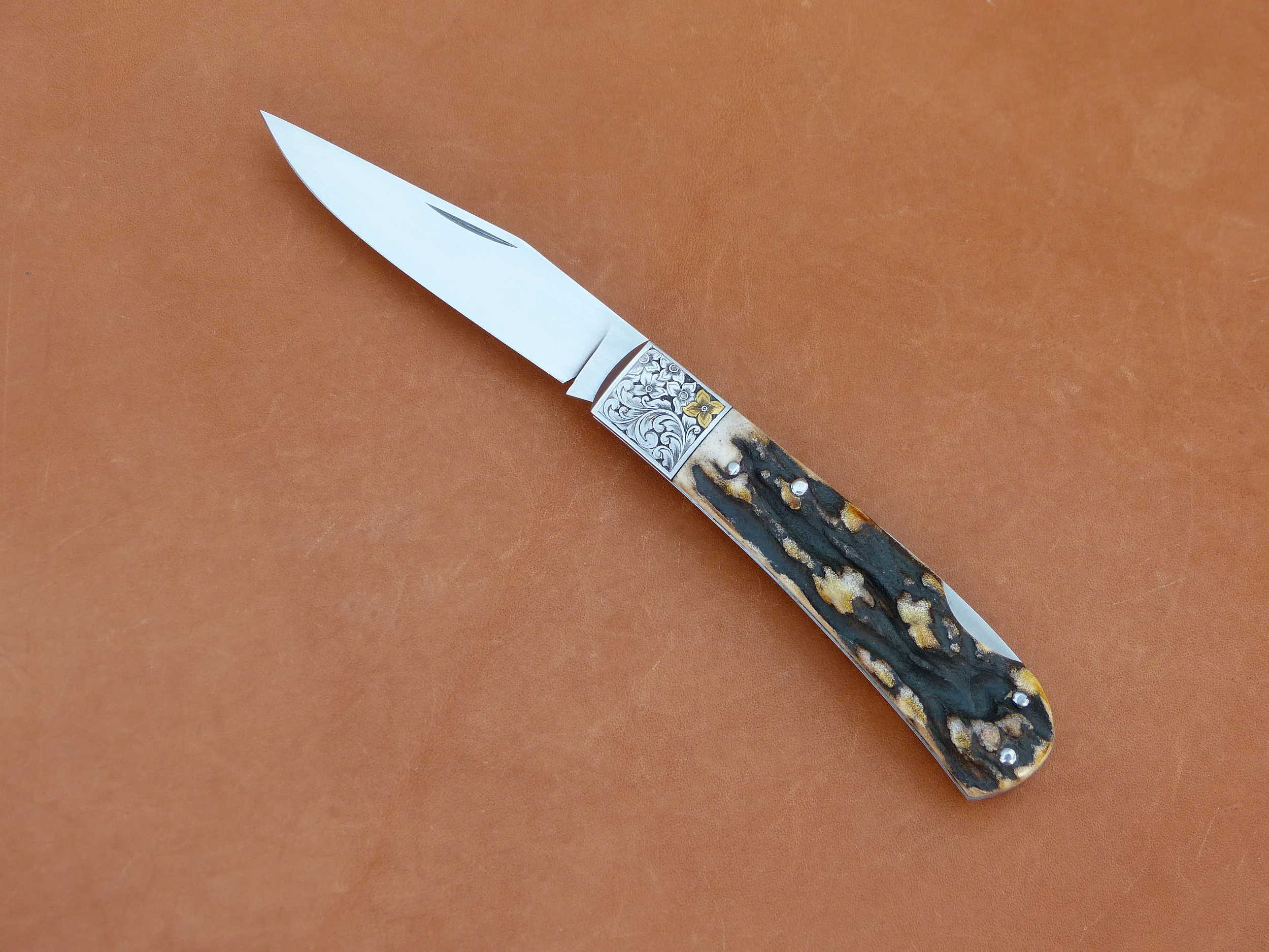  Tim Britton Lock back. SOLD