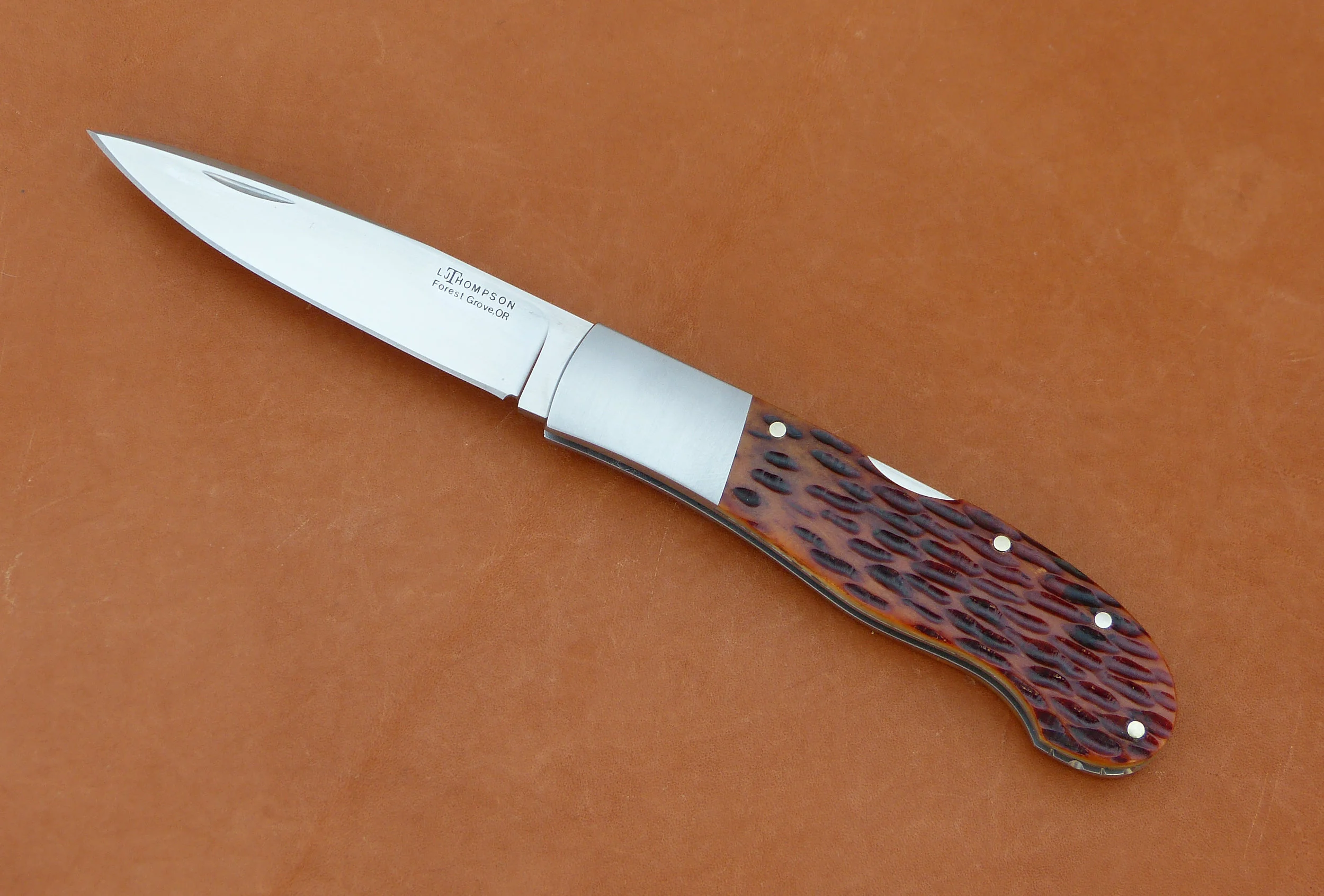 Leon Thompson Lock back $275