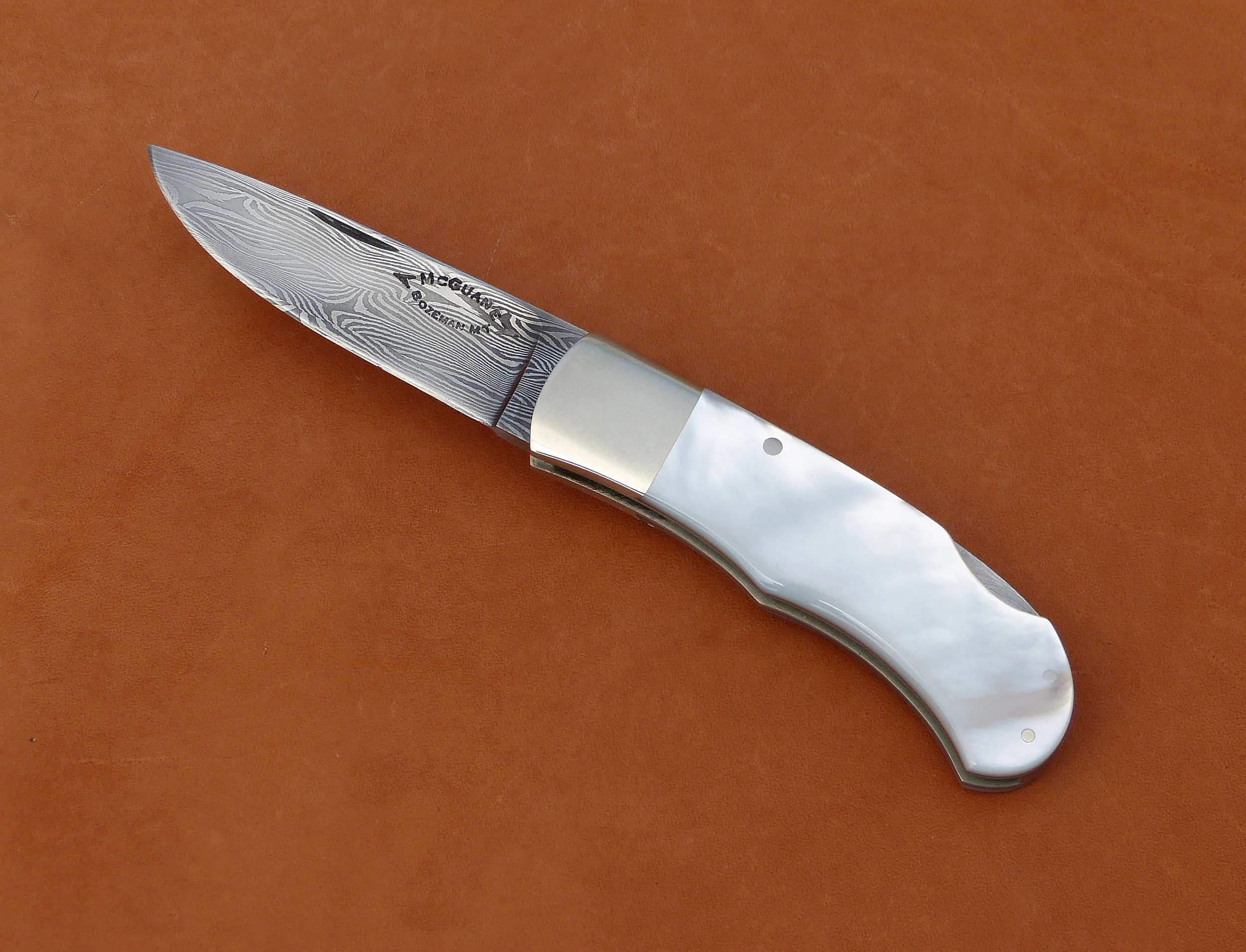 Thomas McGuane lock back. SOLD