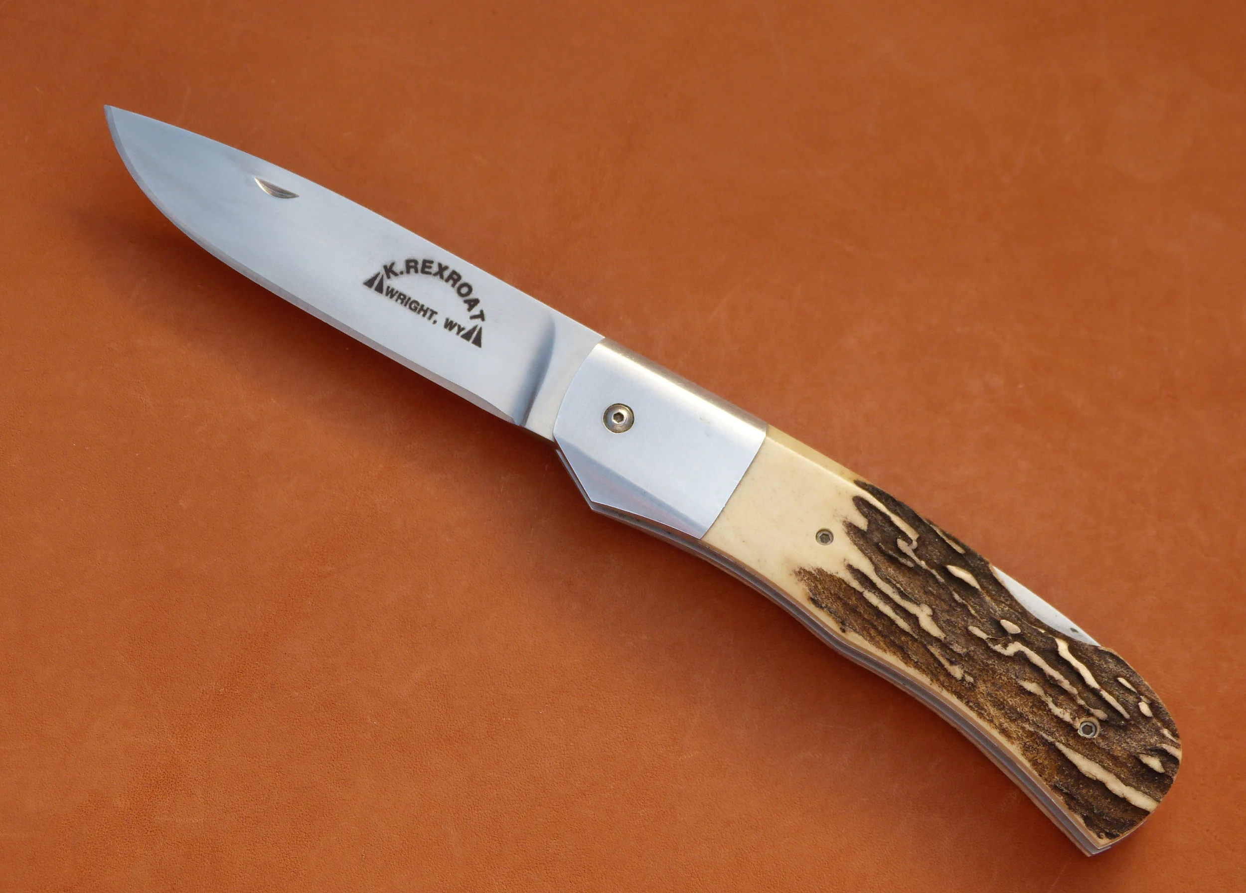 Kirk Rexroat Lock back. SOLD