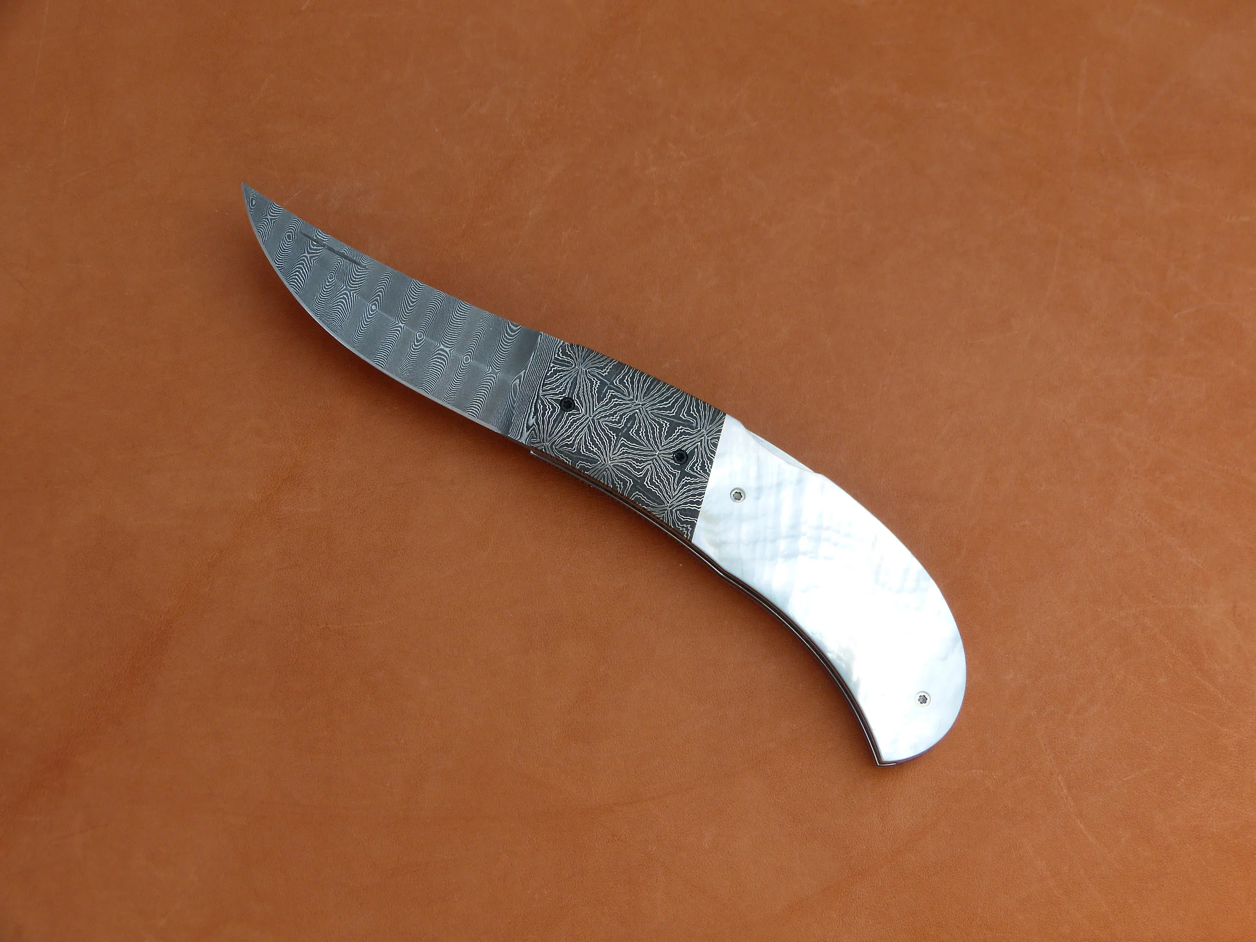 W.E. Ankrom lock back folder. SOLD