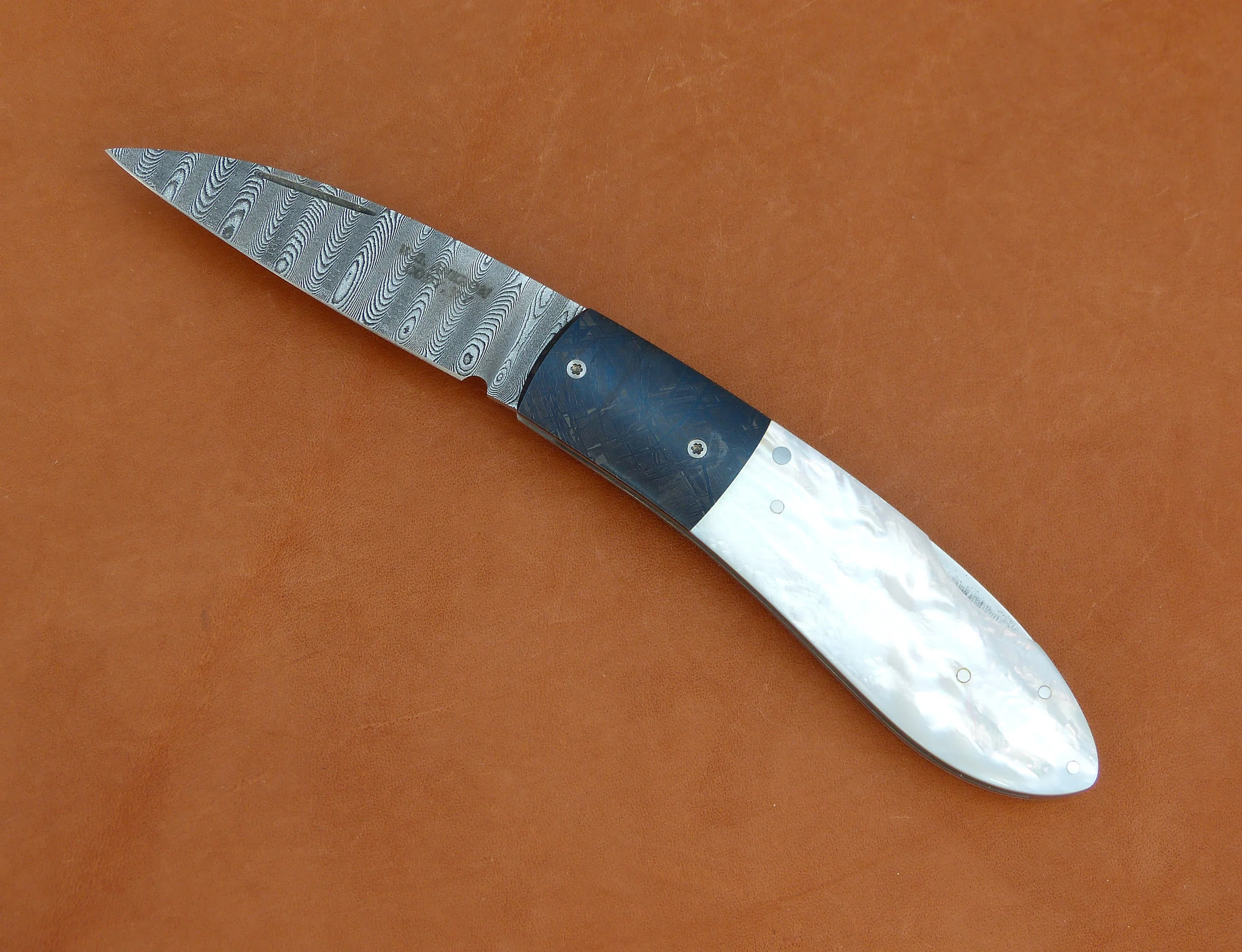 W.E. Ankrom lock back folder. SOLD