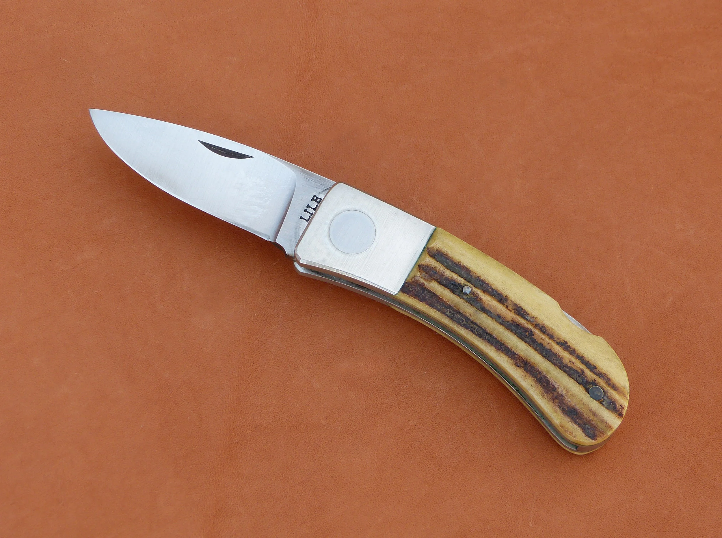 Jimmy Lile lock back folder. SOLD