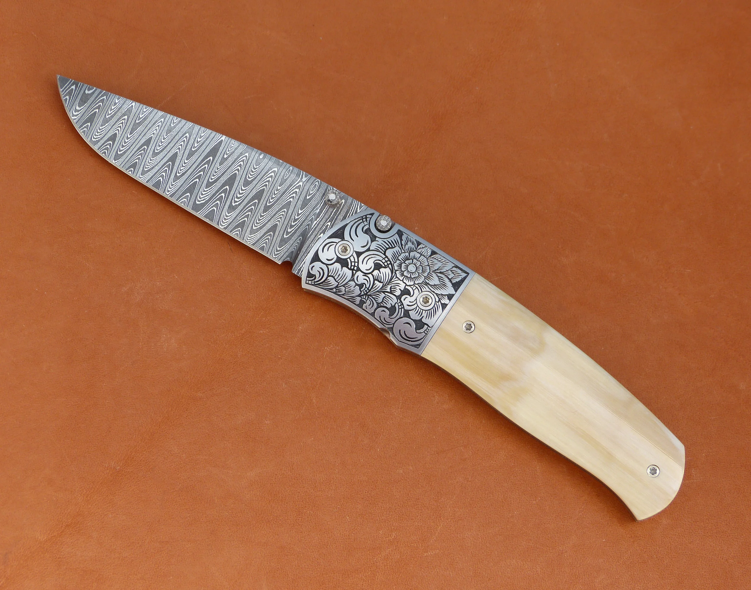 W.E. Ankrom button lock folder. SOLD