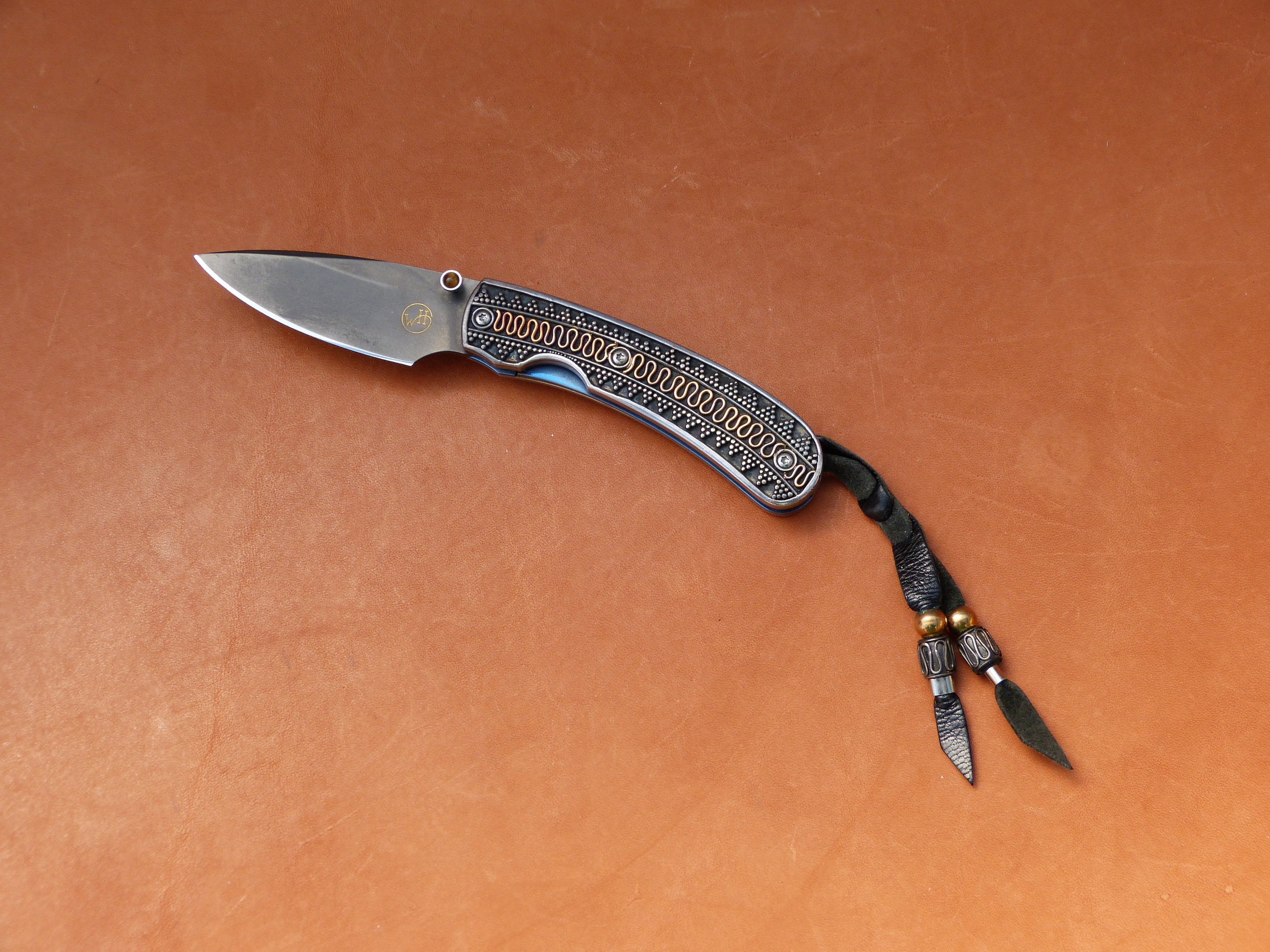 William Henry Sculpted liner lock sterling silver/18k scales. SOLD