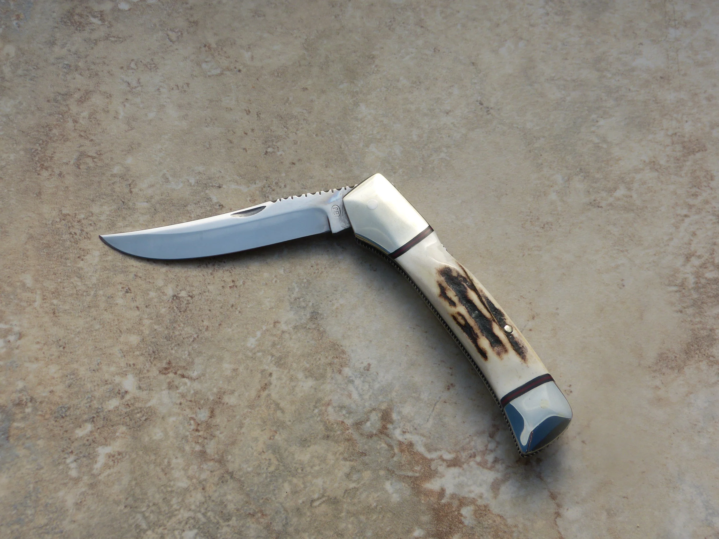 Bob Jones (deceased). Lock back folder. Stag with file work. SOLD