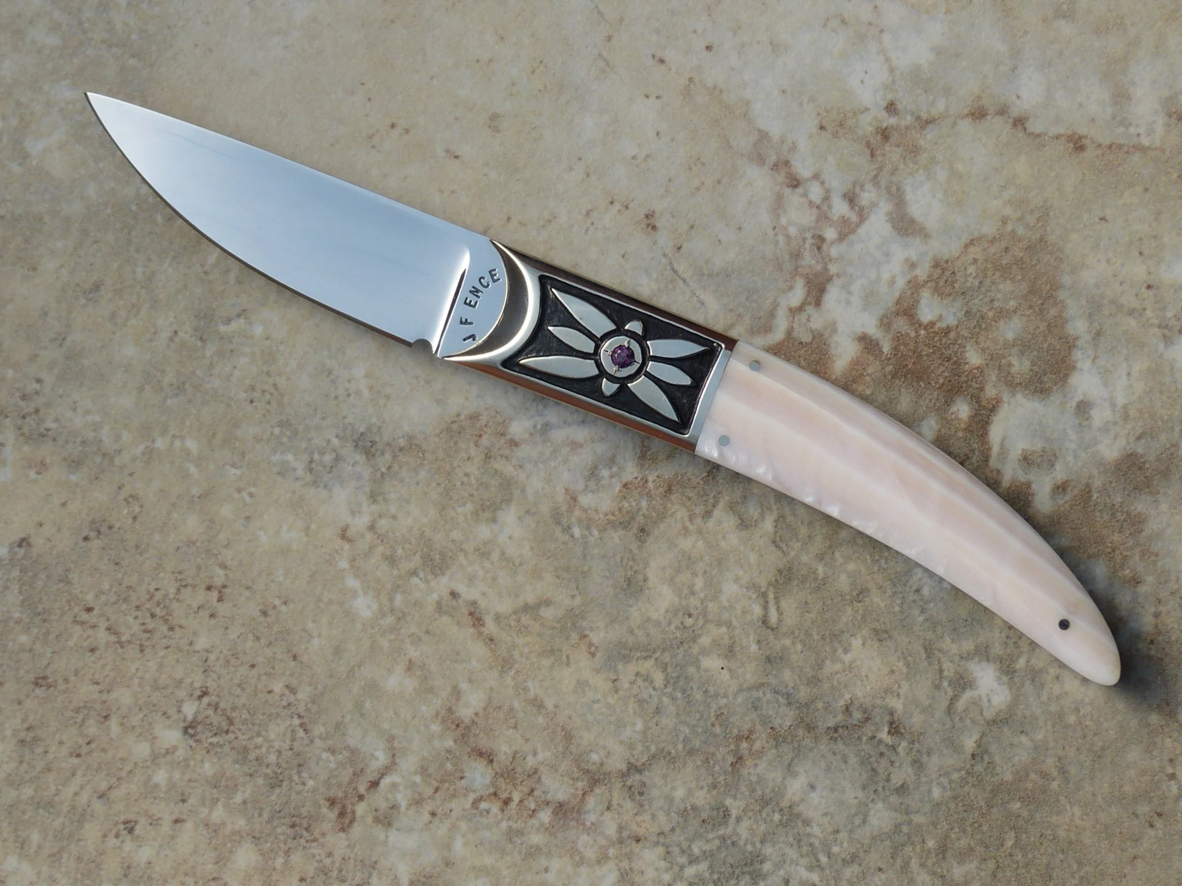 Jim Ence full tang hunter. Pink pearl. Ruby inlay. SOLD