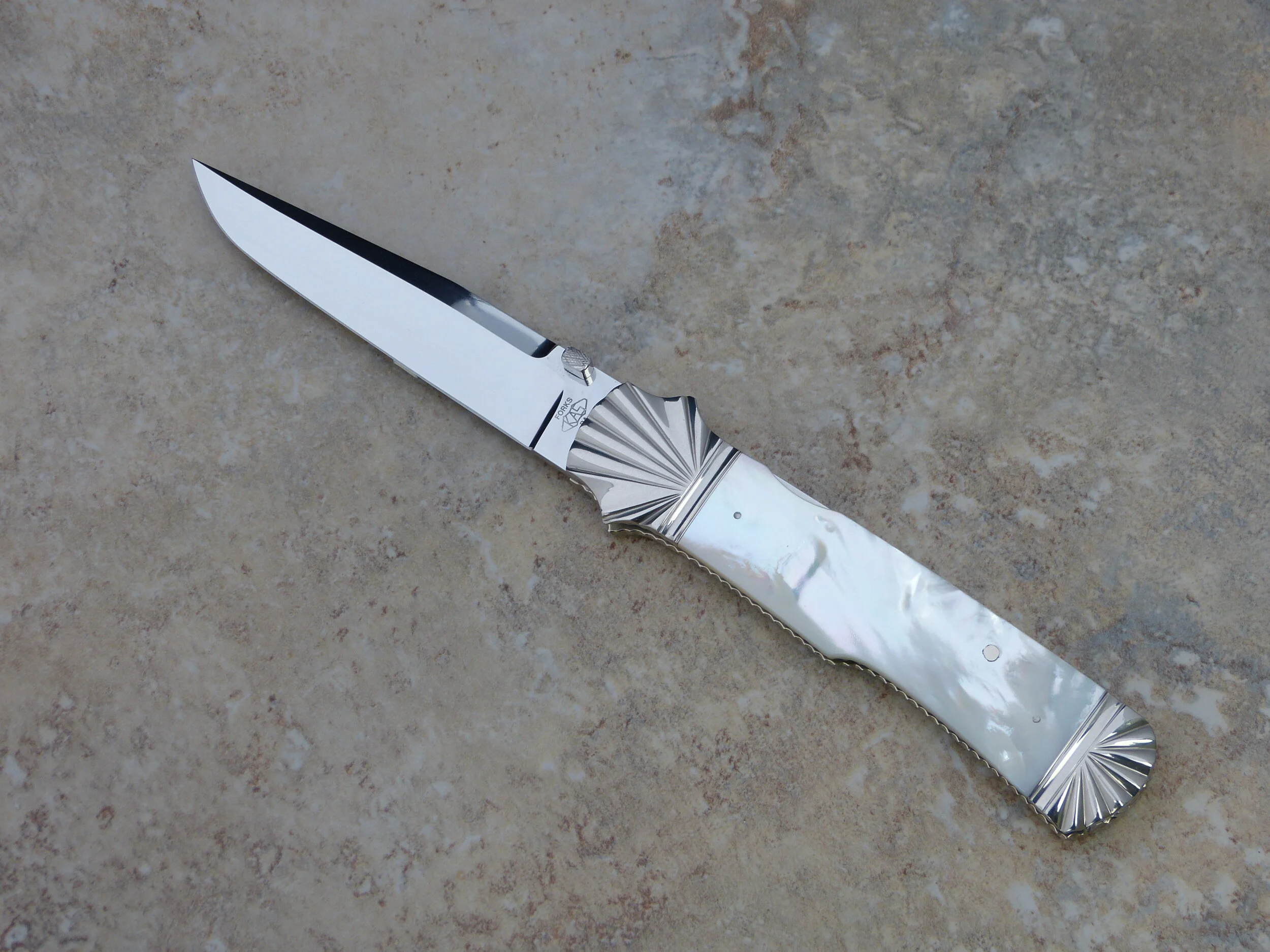 Ken Steigerwalt large front lock folder. SOLD