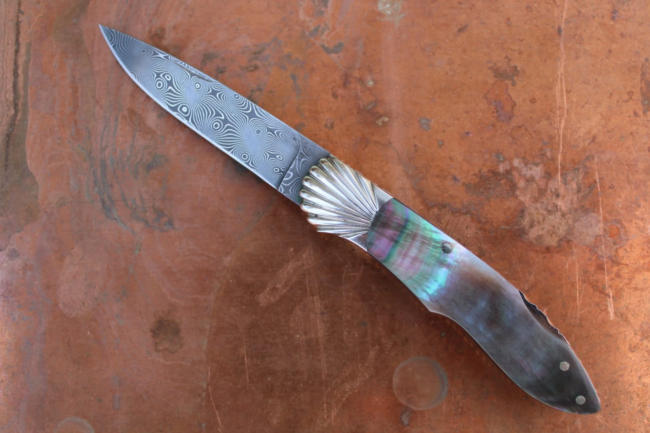 KEN STEIGERWALT DAMASCUS LOCK BACK FOLDER. SOLD