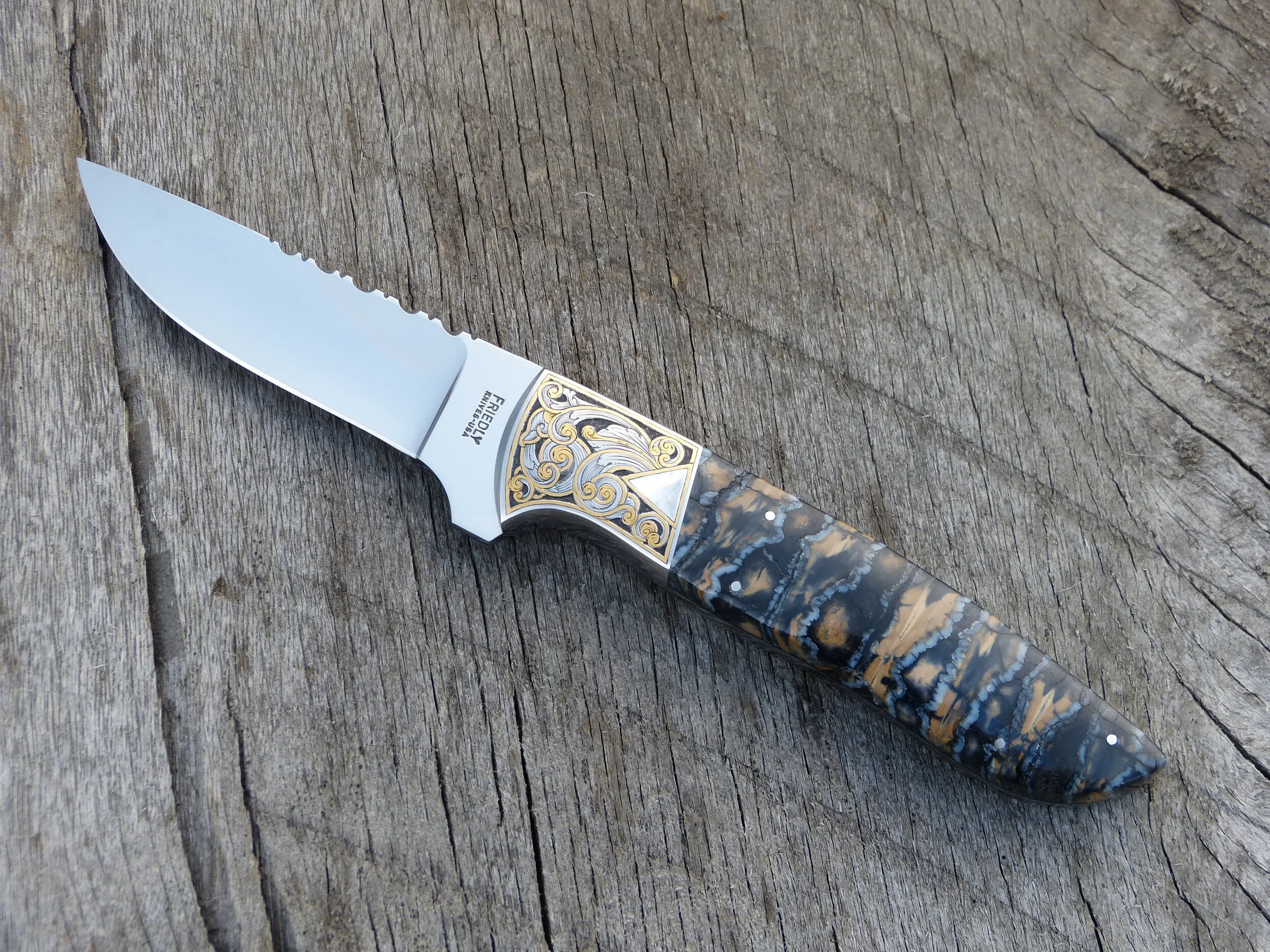 D.E. FRIEDLY DROP POINT "FEATHER HUNTER". GIL RUDOLPH ENGRAVING. SOLD