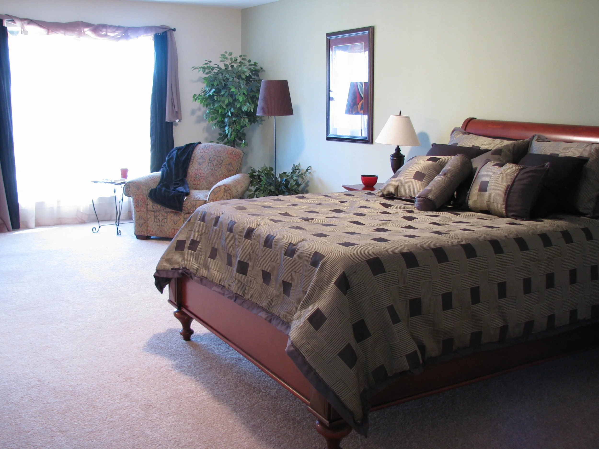 Master bedroom after new paint, carpet, window coverings and of course staging