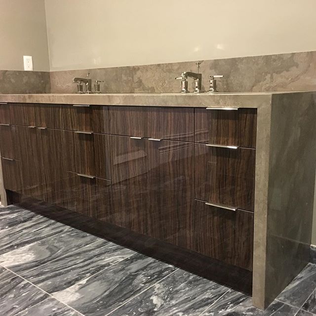 Clean lines meets book match veneers.  @d.signers #bathroomdesign #modernhome