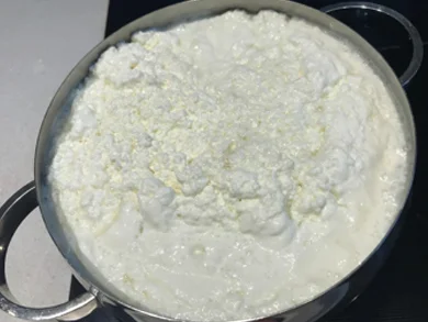 Step 4 In about 30 minutes your cottage cheese should start to form.