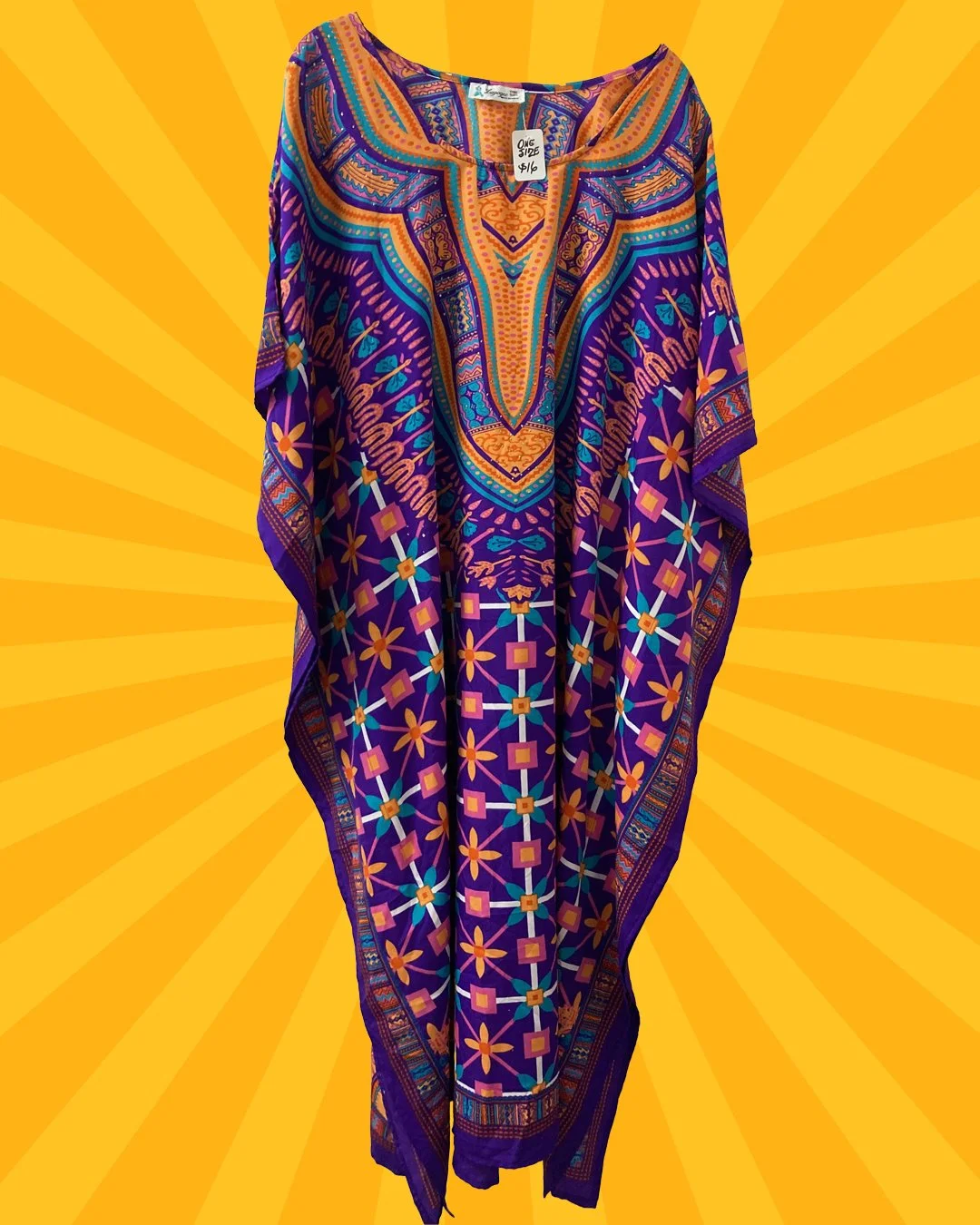 This bold and colorful caftan by Lapogee is 100% polyester, one size and made in India. $16 only at GinaWare! Open today 12-4pm.