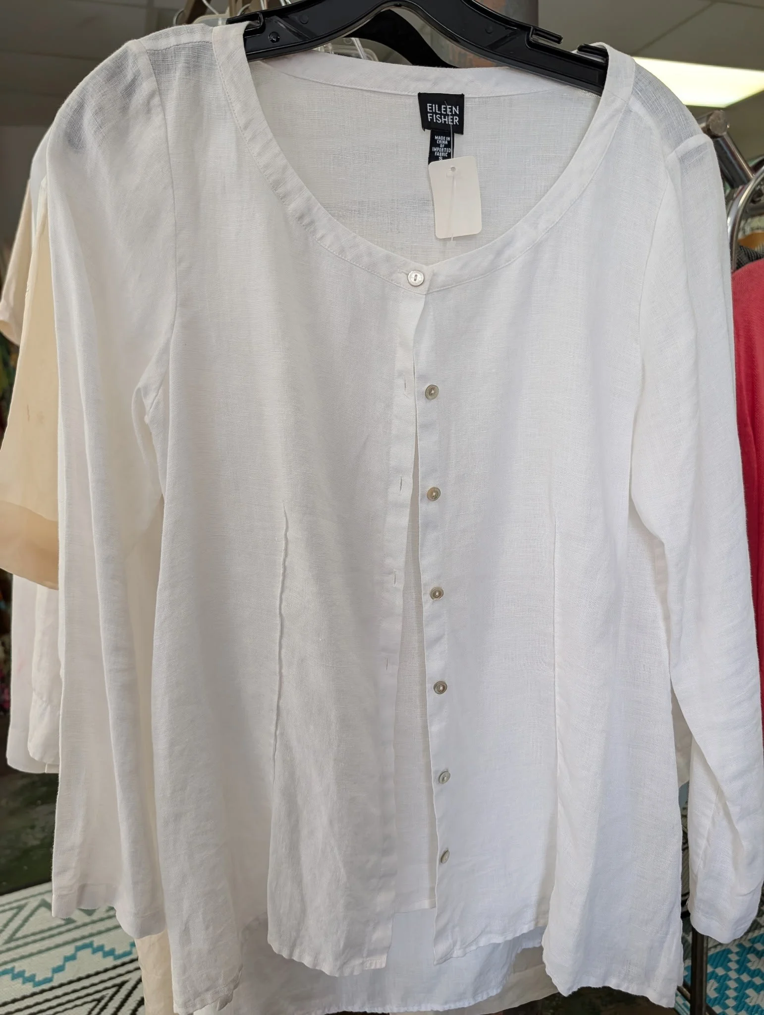 White Linen Night is Saturday evening! Do you have your fit ready? We can help! We have linen tops for men and women. Like this pretty Eileen Fisher blouse or this Guayabera style shirt. We've also pulled together all our red dresses for the Red Dres