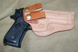 This Beretta M9 is kept at home ready in a Milt Sparks Summer Special holster