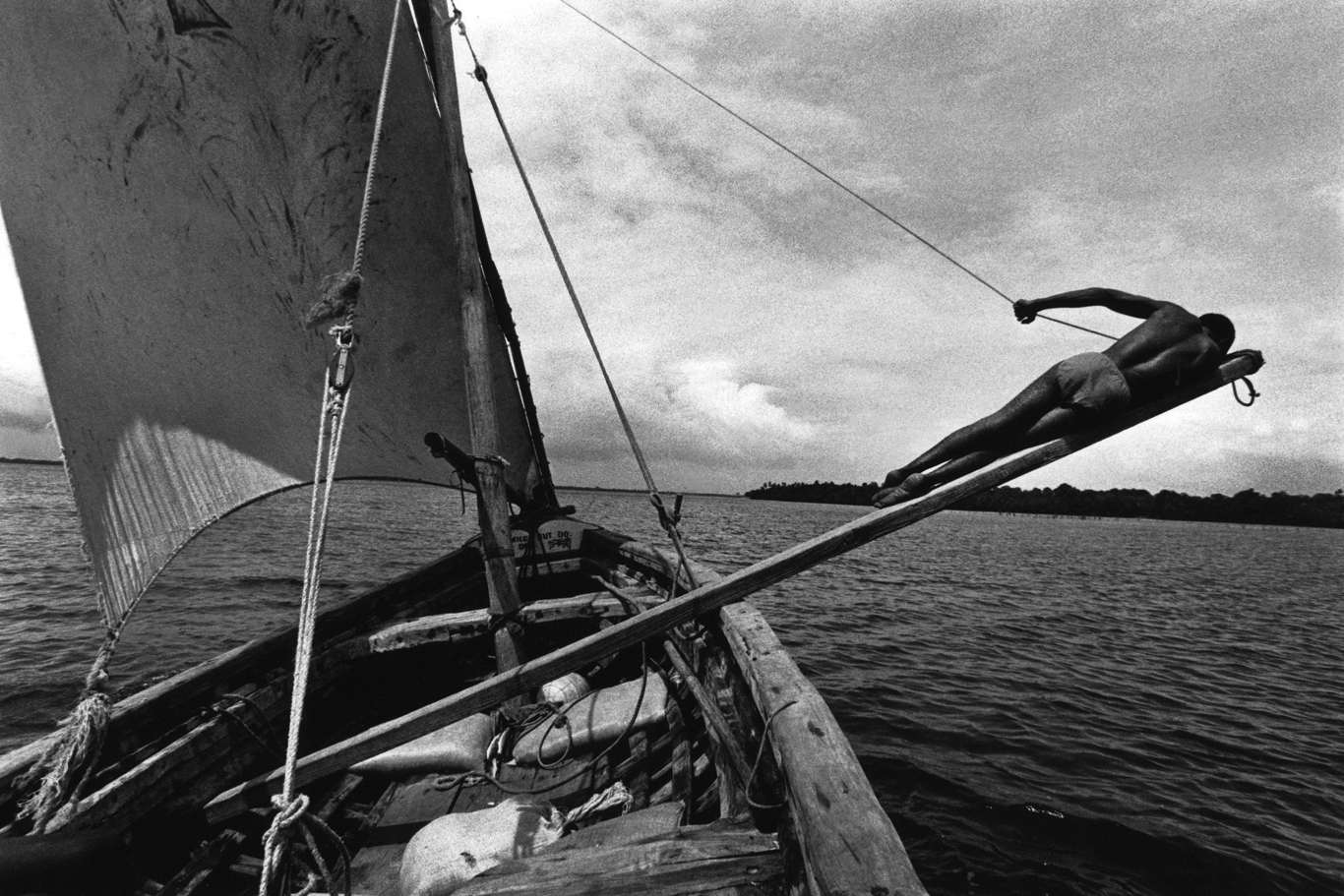  ‘Trapeze’ A sailor upon the trapeze off the coast of Mombasa, Kenya. 1999  