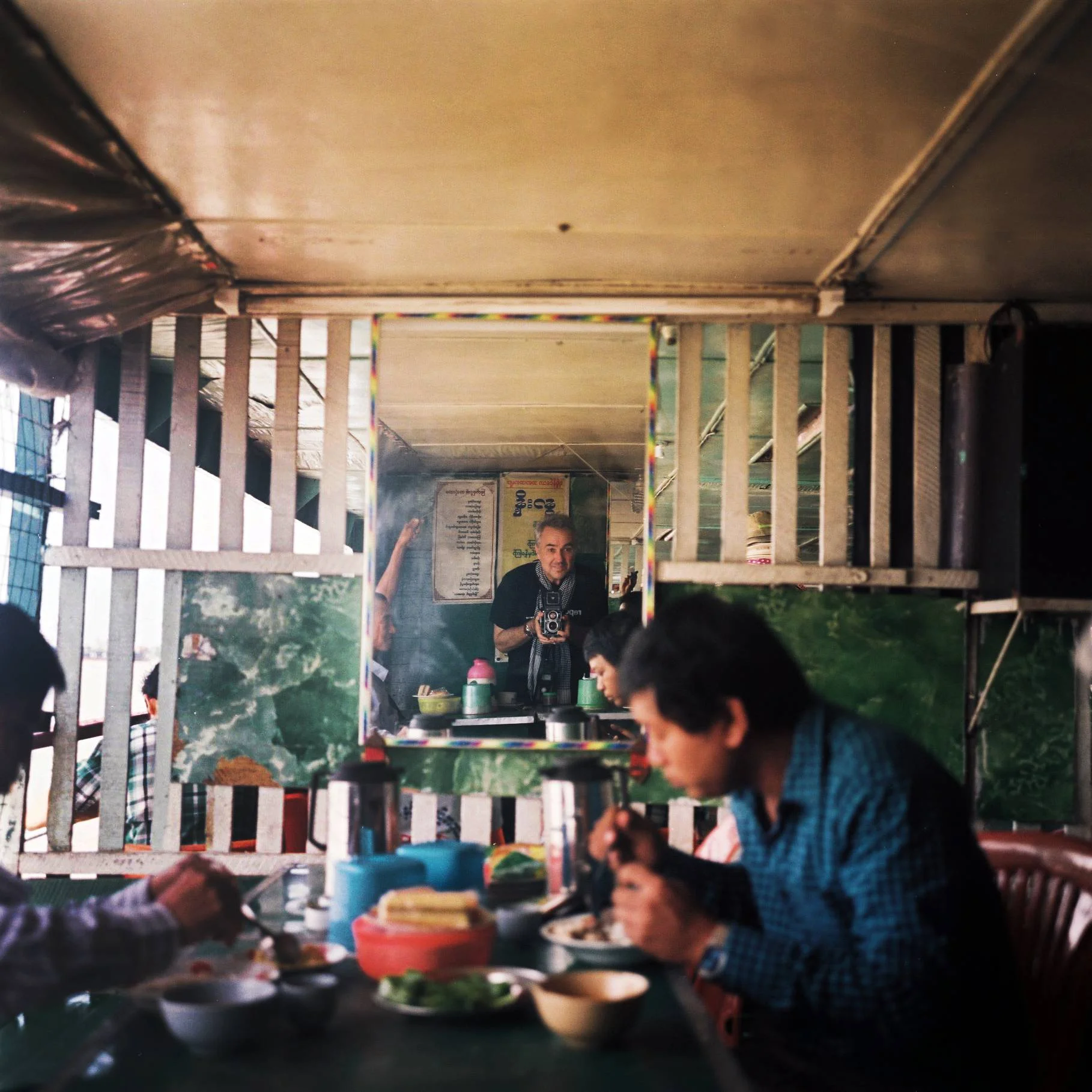 Jack Picone (self-portrait) with Rollei. Crossing the Rangoon River. Yangon, Myanmar. 2014 