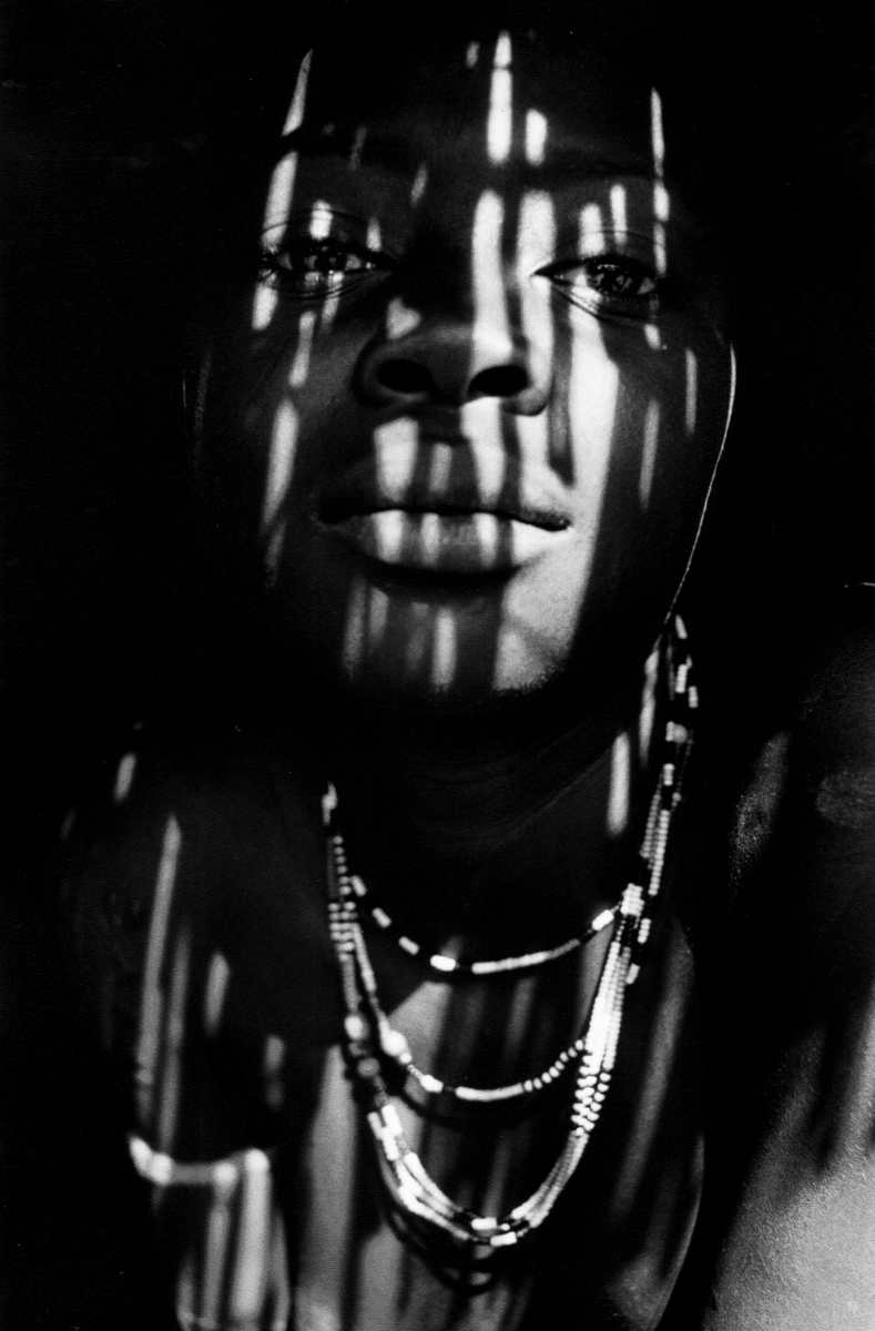  "Dream Gaze" Nuba woman in the Nuba Mountains, Sudan. 1996 