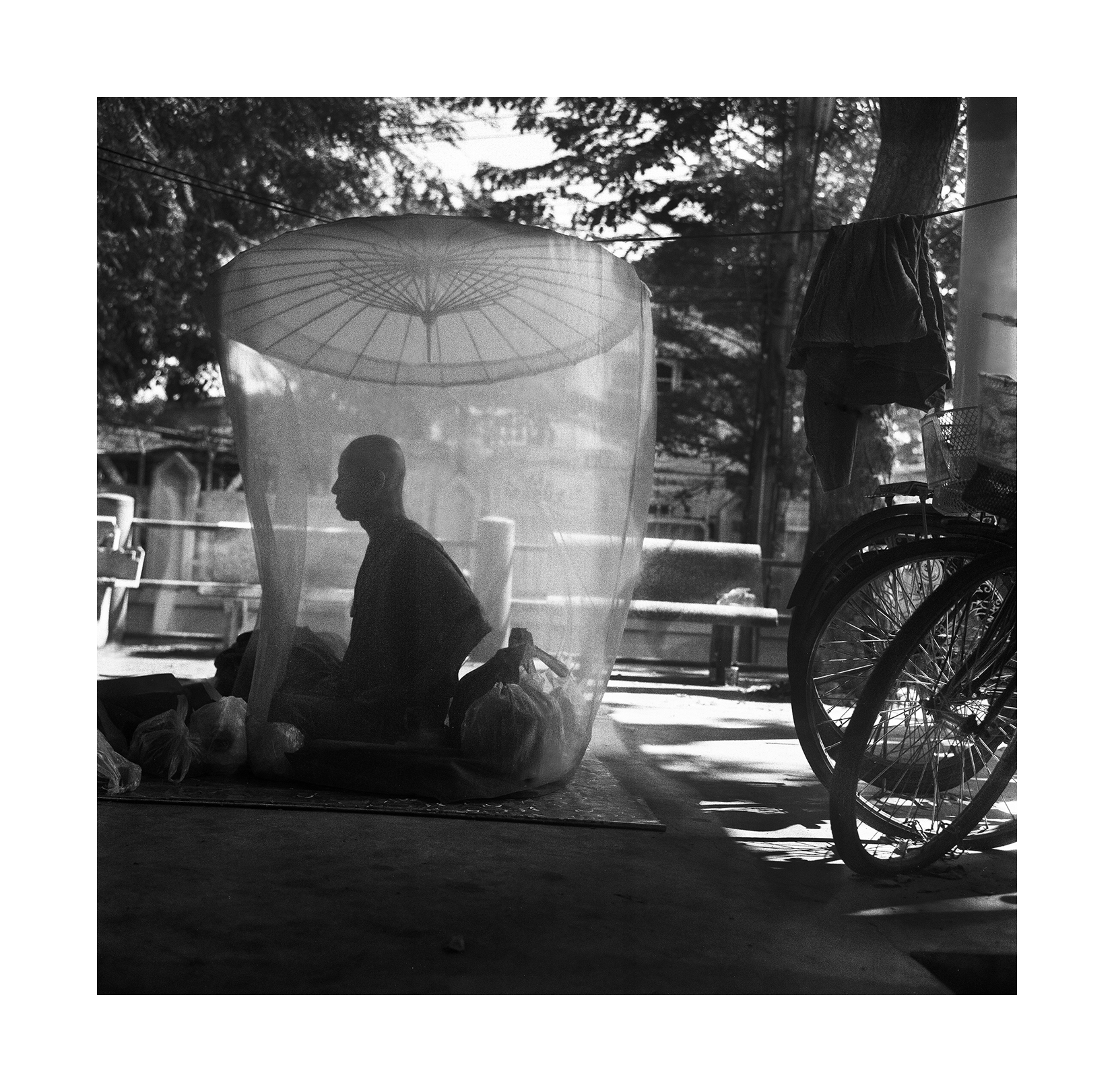  "Monk And Mosquito Net." Thailand. 2015 