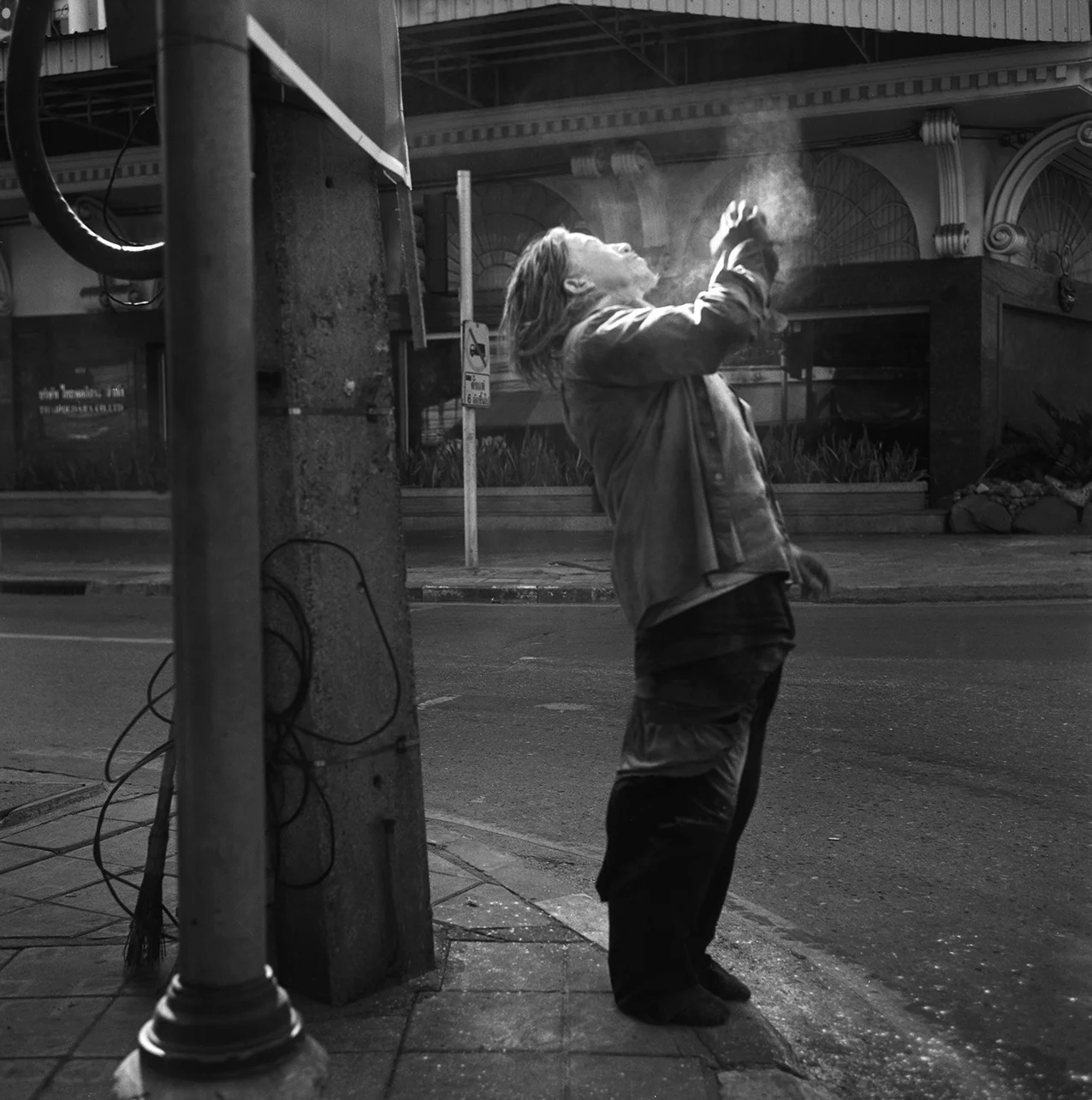  "Talcum Powder Shower." Early morning hours. Bangkok, Thailand, 2014 