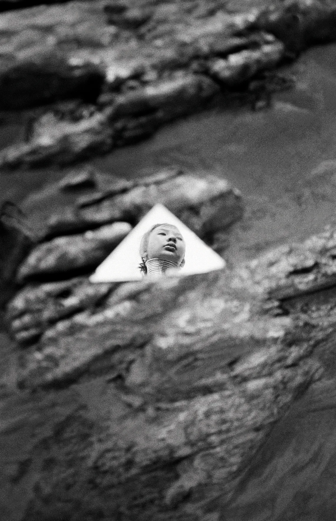 "Reflection." Padong woman in the village of Nai Soi. Thai-Burma border. 2004