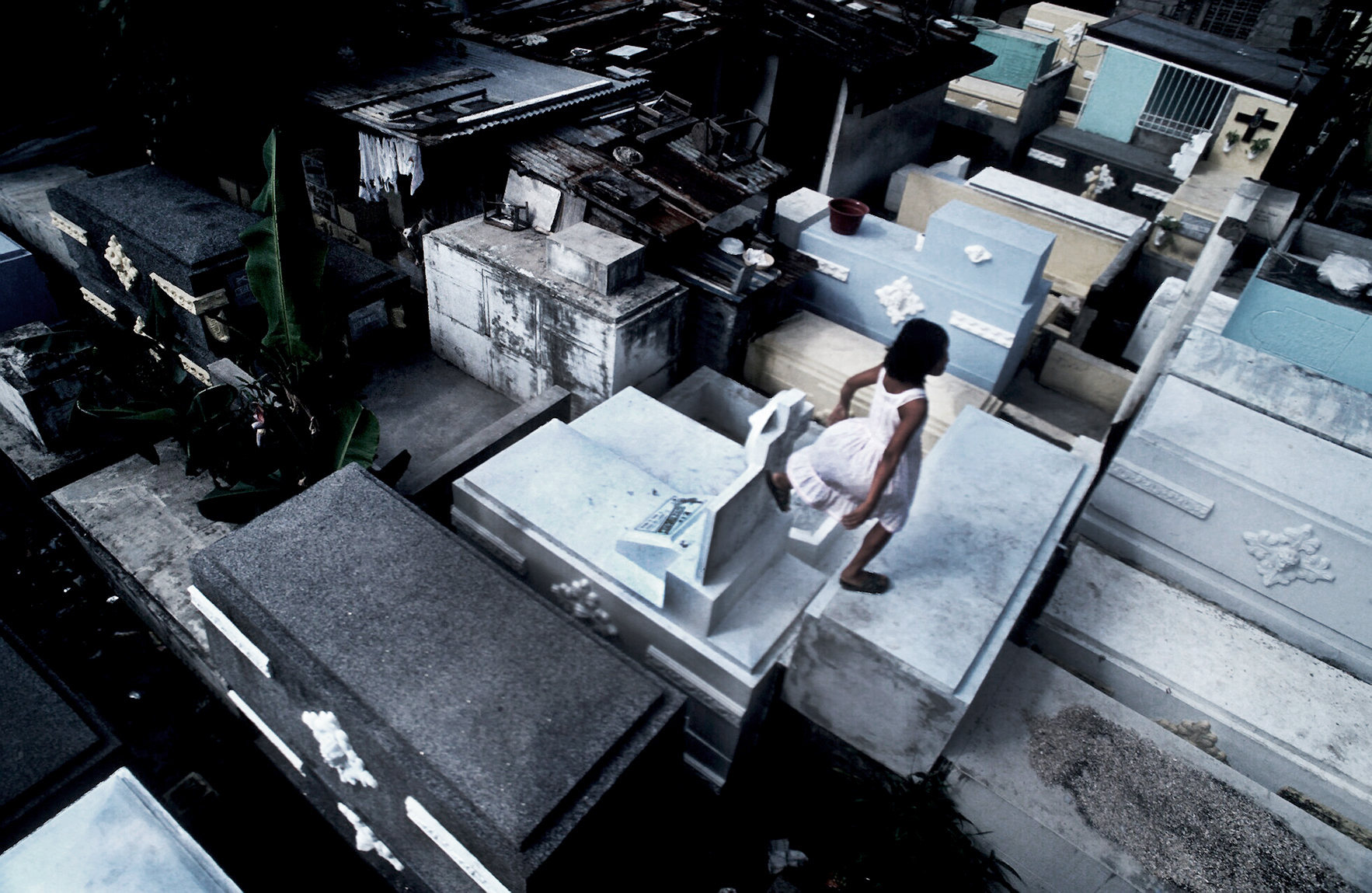  On the way to school. Manila’s Catholic cemetery. The Philippines. 1994 