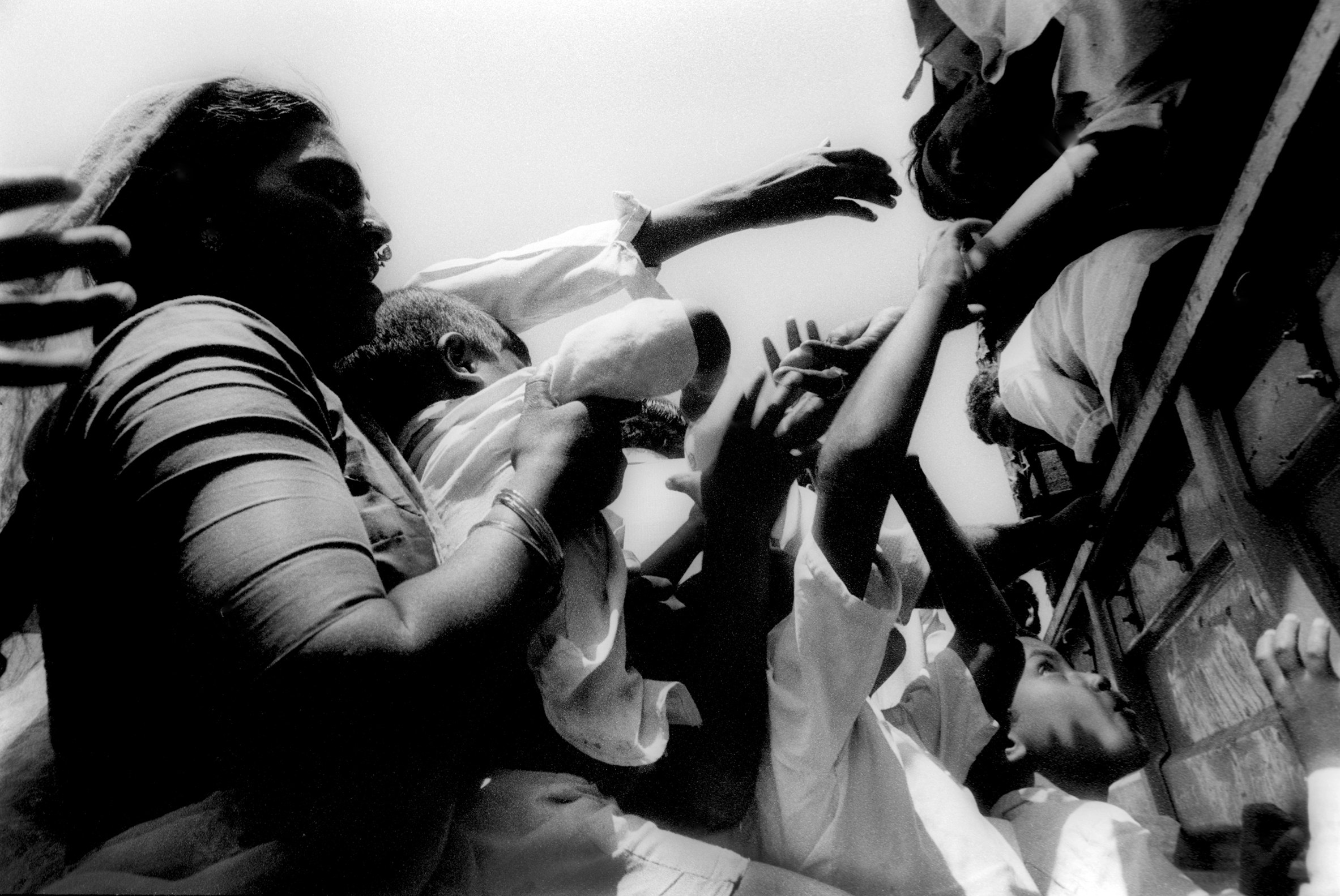  Maharashtra earthquake survivors receive aide. India, 1993 