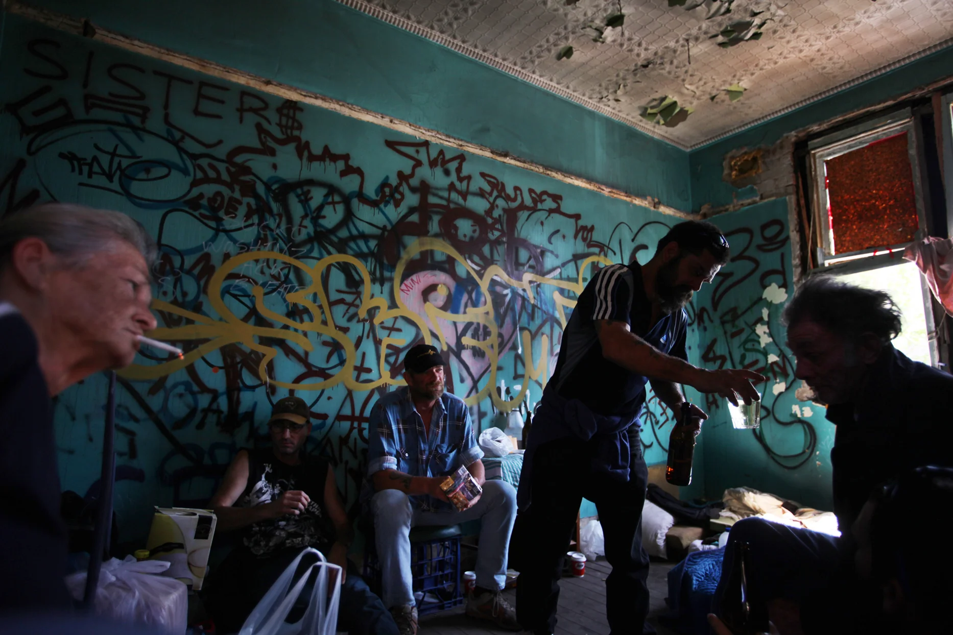 Summary: These pictures are a reportage of the daily struggle of life of alcoholic and homeless people who live in Newcastle, Australia. The lives of alcoholics in Newcastle, show patterns of structured behavior with territorial and social layers. They have a distinctive group identity and a moral order is present. Their subculture is complex with strains of non-patriarchal and patriarchal relations combined with little tolerance towards outside groups. The moral code of the alcoholics subculture may be a reaction to their histories of abuse but is also conservative in reproducing aspects of the culture that they resist. The social networks and in some cases the deep seated friendships made on the street provide a force of survival.