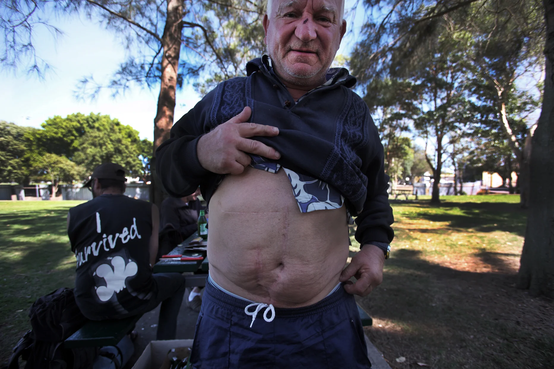 Summary: These pictures are a reportage of the daily struggle of life of alcoholic and homeless people who live in Newcastle, Australia. The lives of alcoholics in Newcastle, show patterns of structured behavior with territorial and social layers. They have a distinctive group identity and a moral order is present. Their subculture is complex with strains of non-patriarchal and patriarchal relations combined with little tolerance towards outside groups. The moral code of the alcoholics subculture may be a reaction to their histories of abuse but is also conservative in reproducing aspects of the culture that they resist. The social networks and in some cases the deep seated friendships made on the street provide a force of survival.