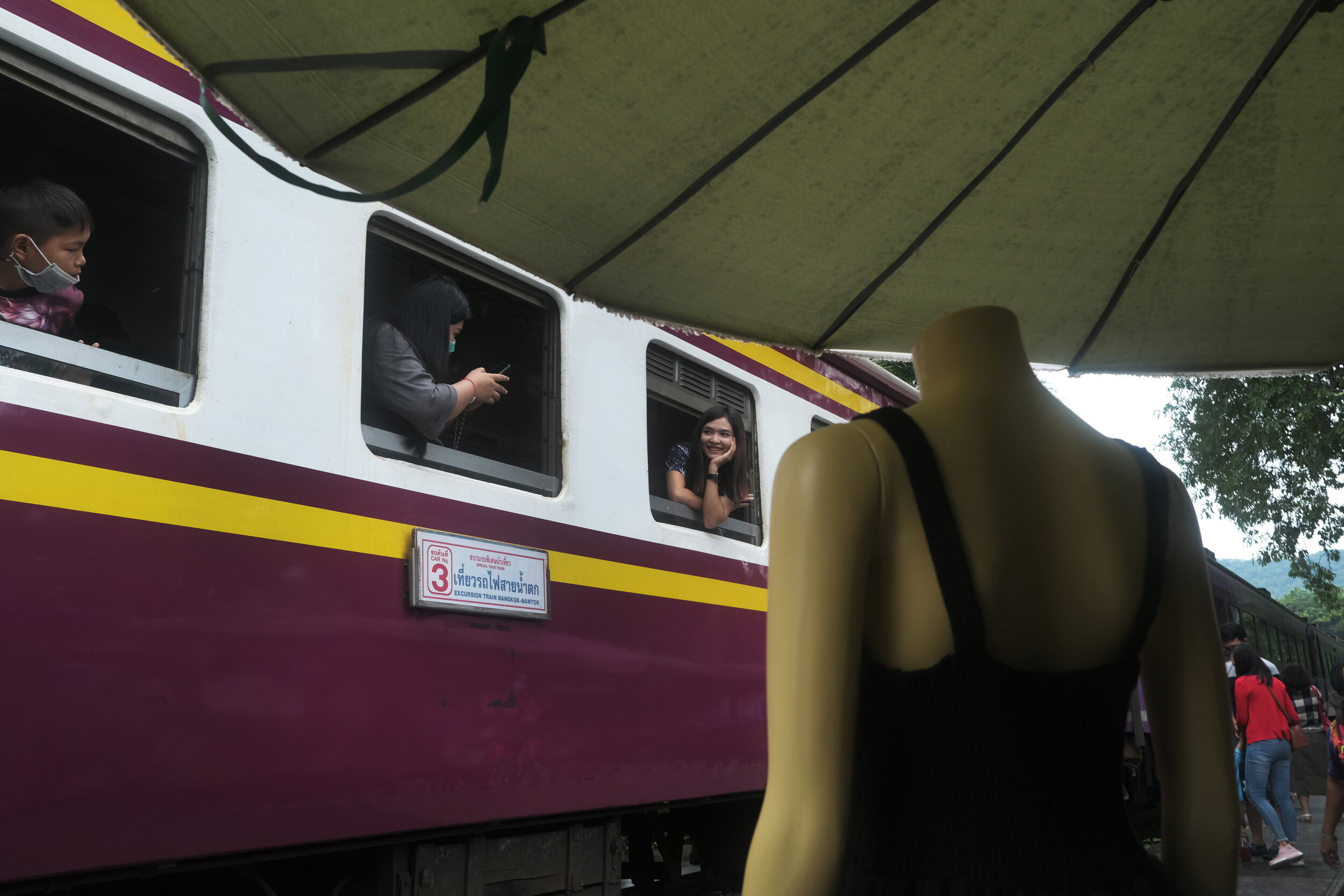  Passengers board at River Kwai Bridge station. The train travels along the infamous ‘death railway’ built by Allied prisoners of war during World War II.  