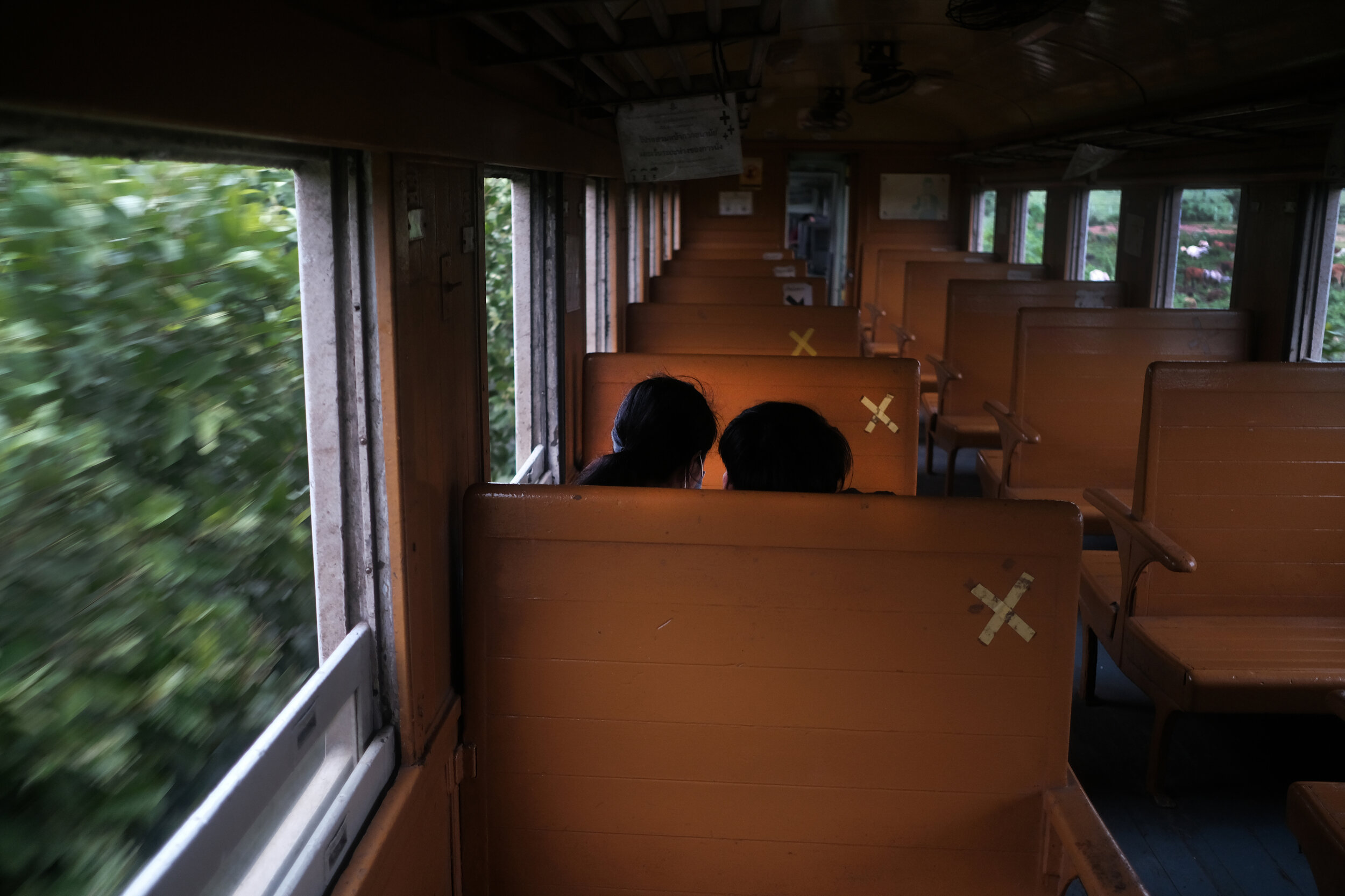  A couple en route to Nam Tok. The train travels along the infamous ‘death railway’ built by Allied prisoners of war during World War II. 