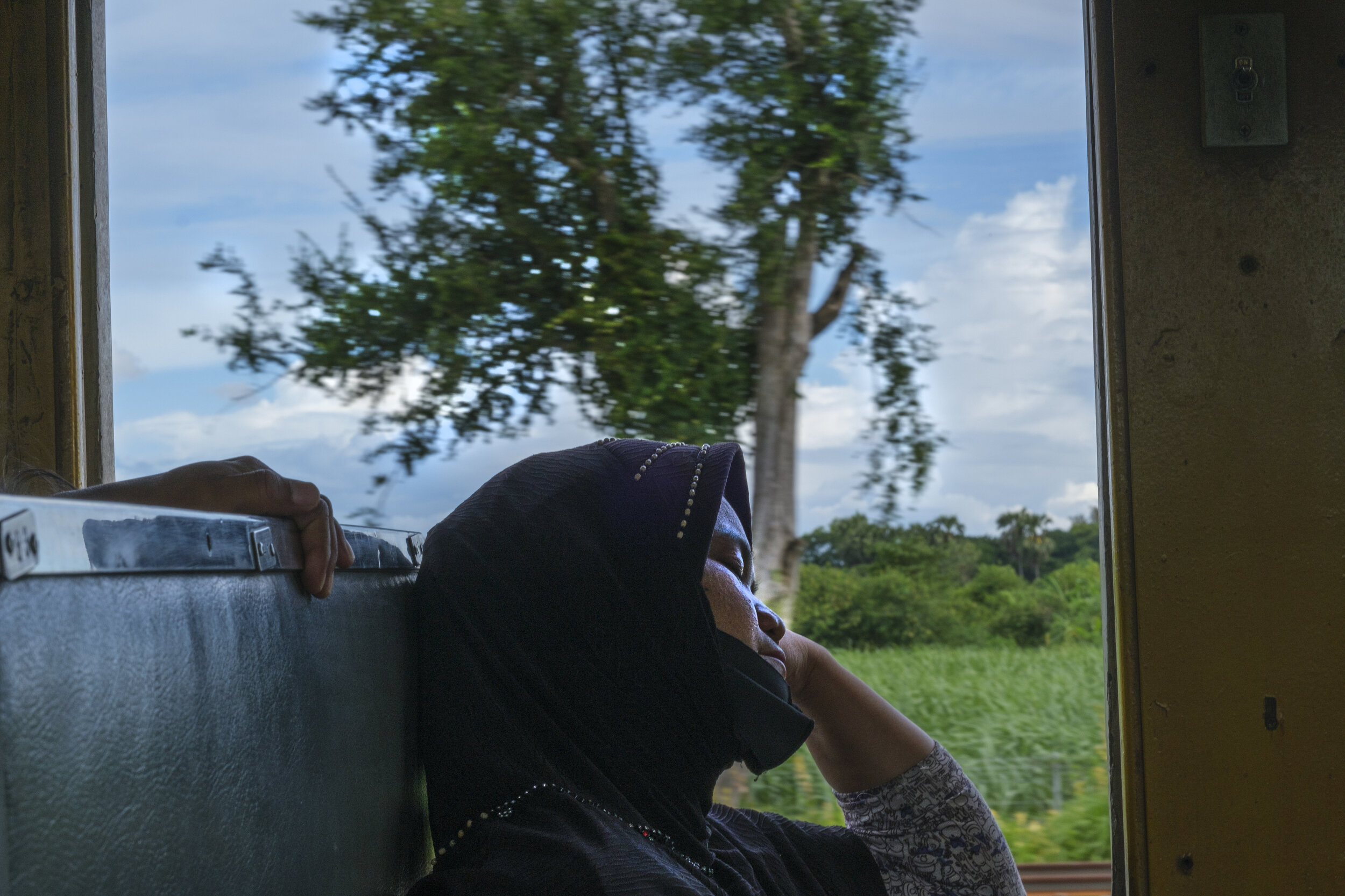  Sleeping en route to Nam Tok. The train travels along the infamous ‘death railway’ built by Allied prisoners of war during World War II. 