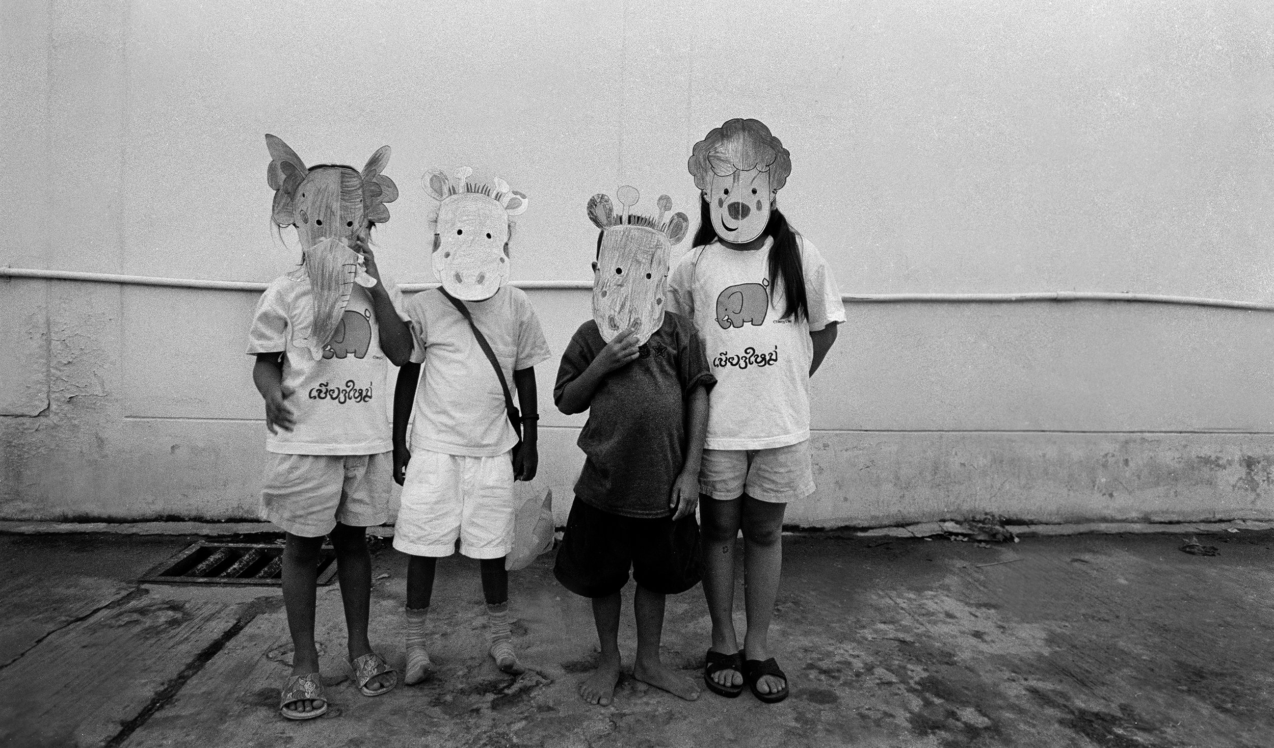  "Party" Children at the Agape orphanage for those living with HIV. Chiang Mai, Thailand. The mid-1990s. 