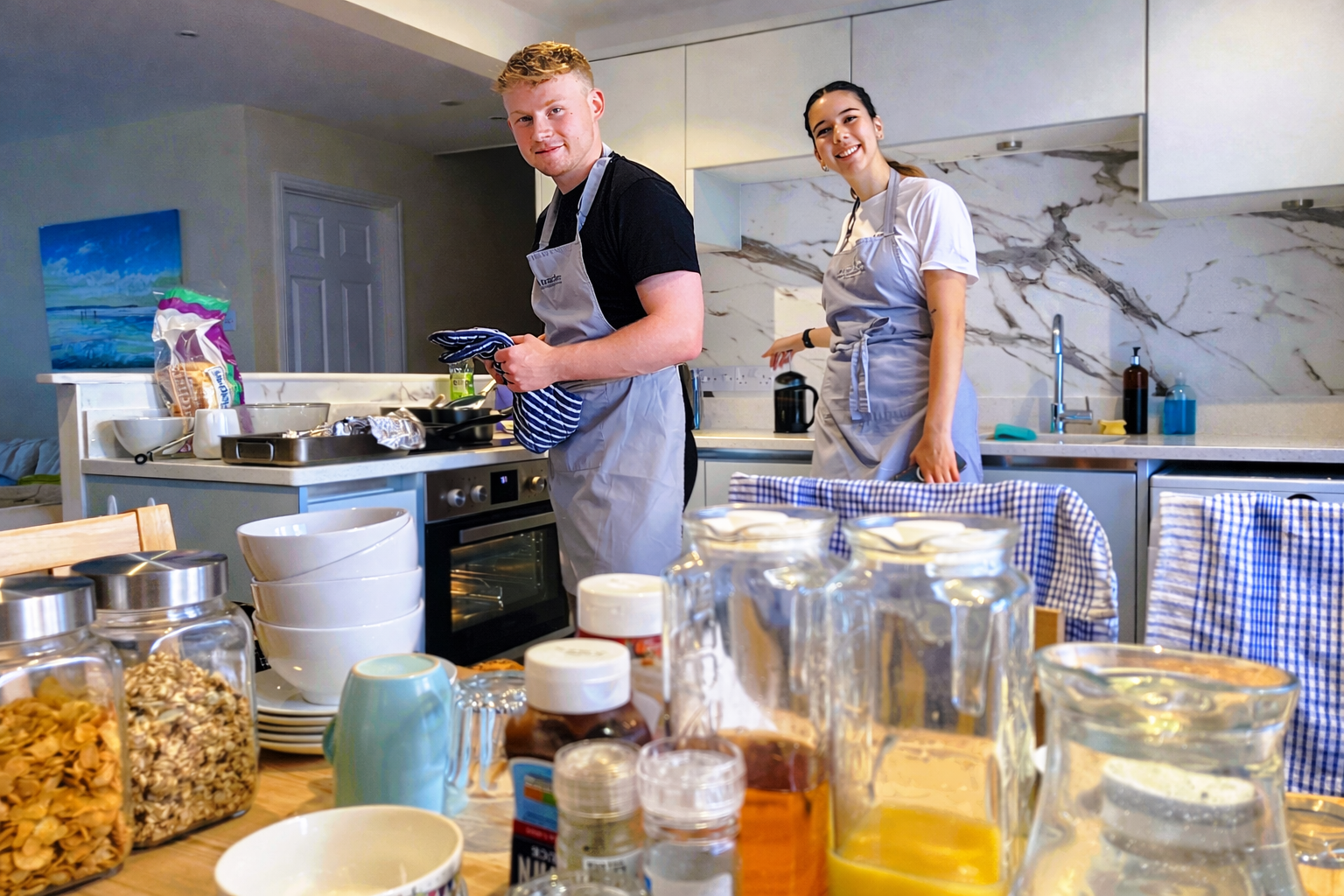 making breakfast as part of residential chalet host training course in summer