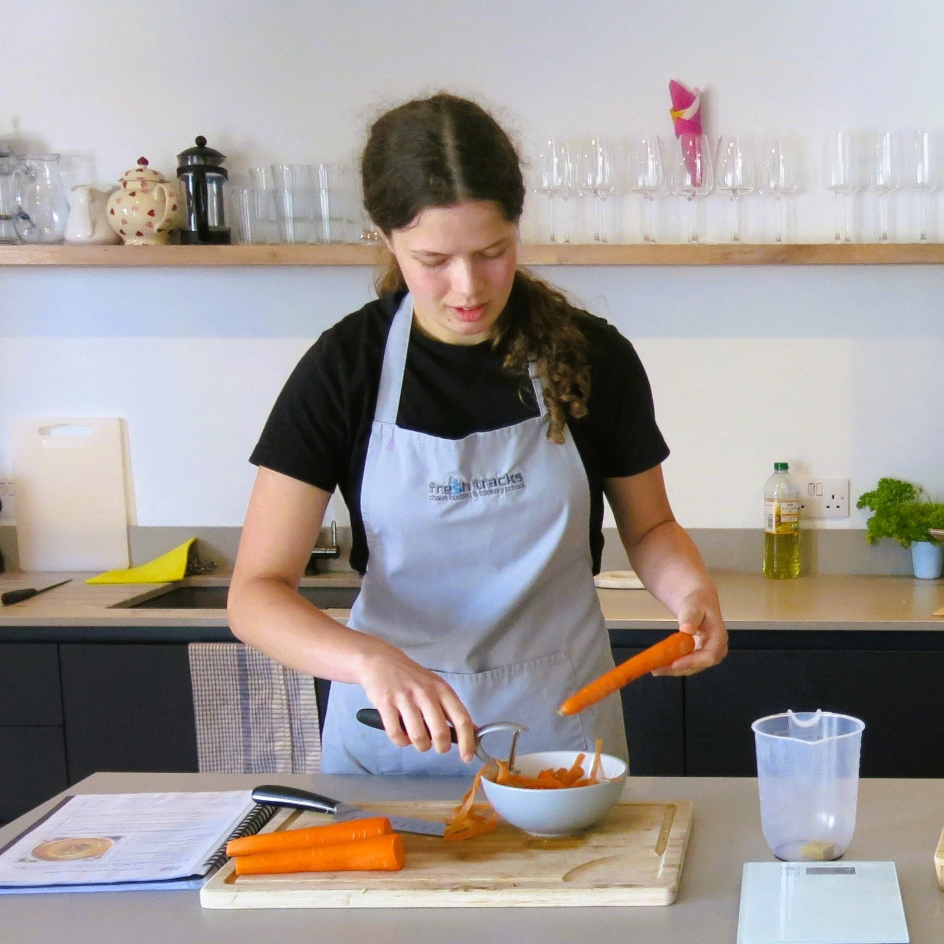 Image of student cooking on the aspiring chalet cooks course level from fresh tracks chalet hosting and cookery school