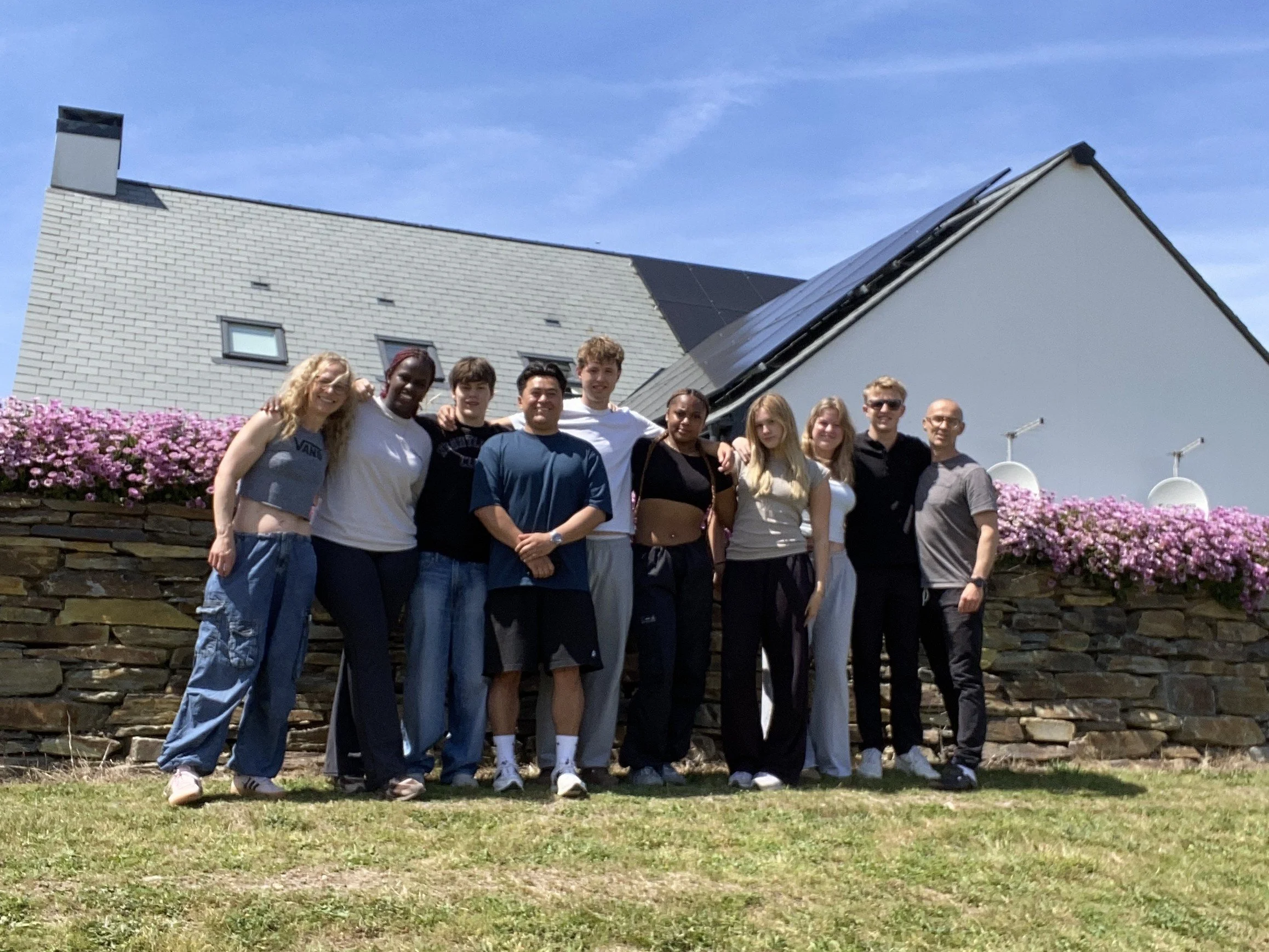 Group of students in the garden in the sunshine