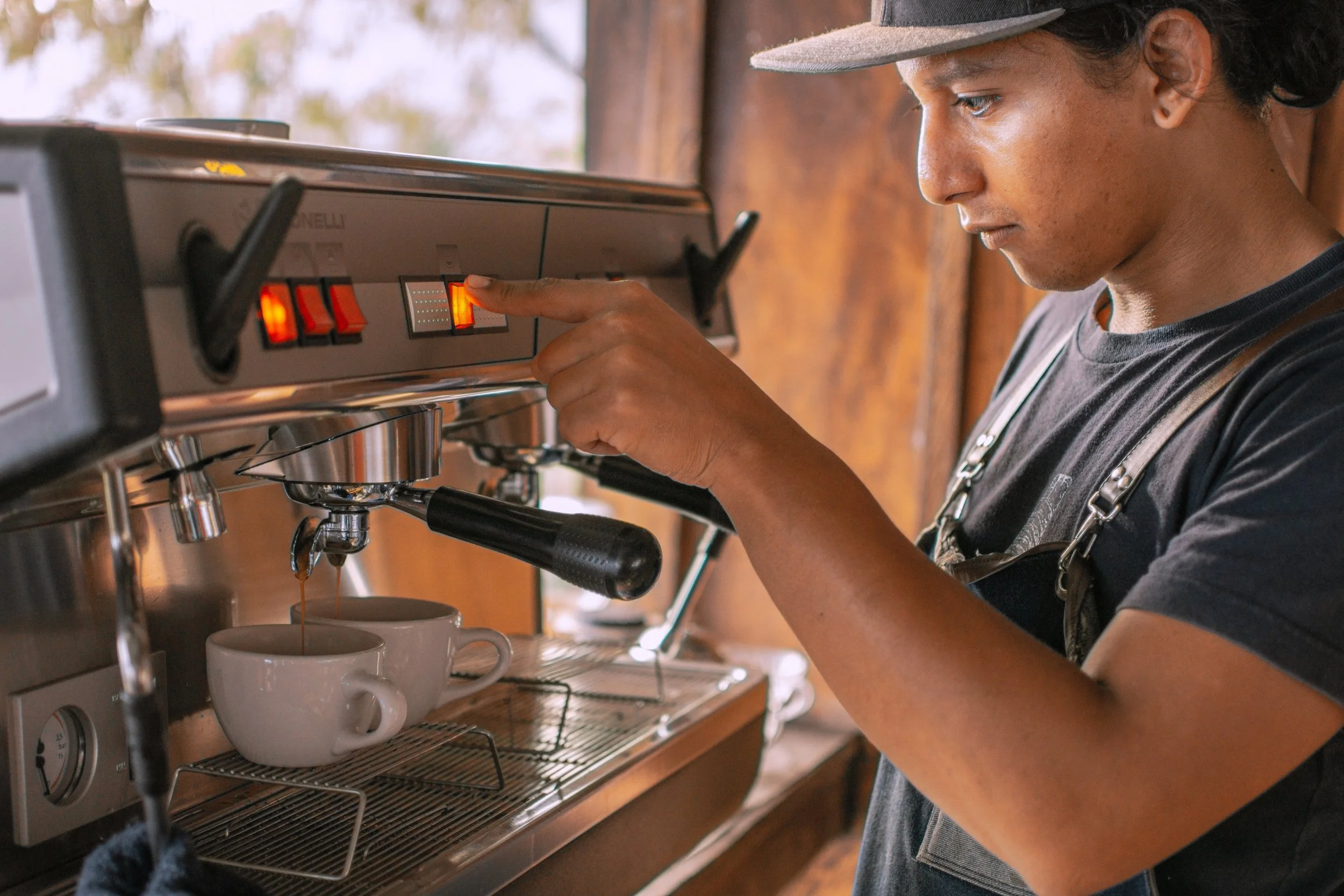 Barista making a cup of coffee
